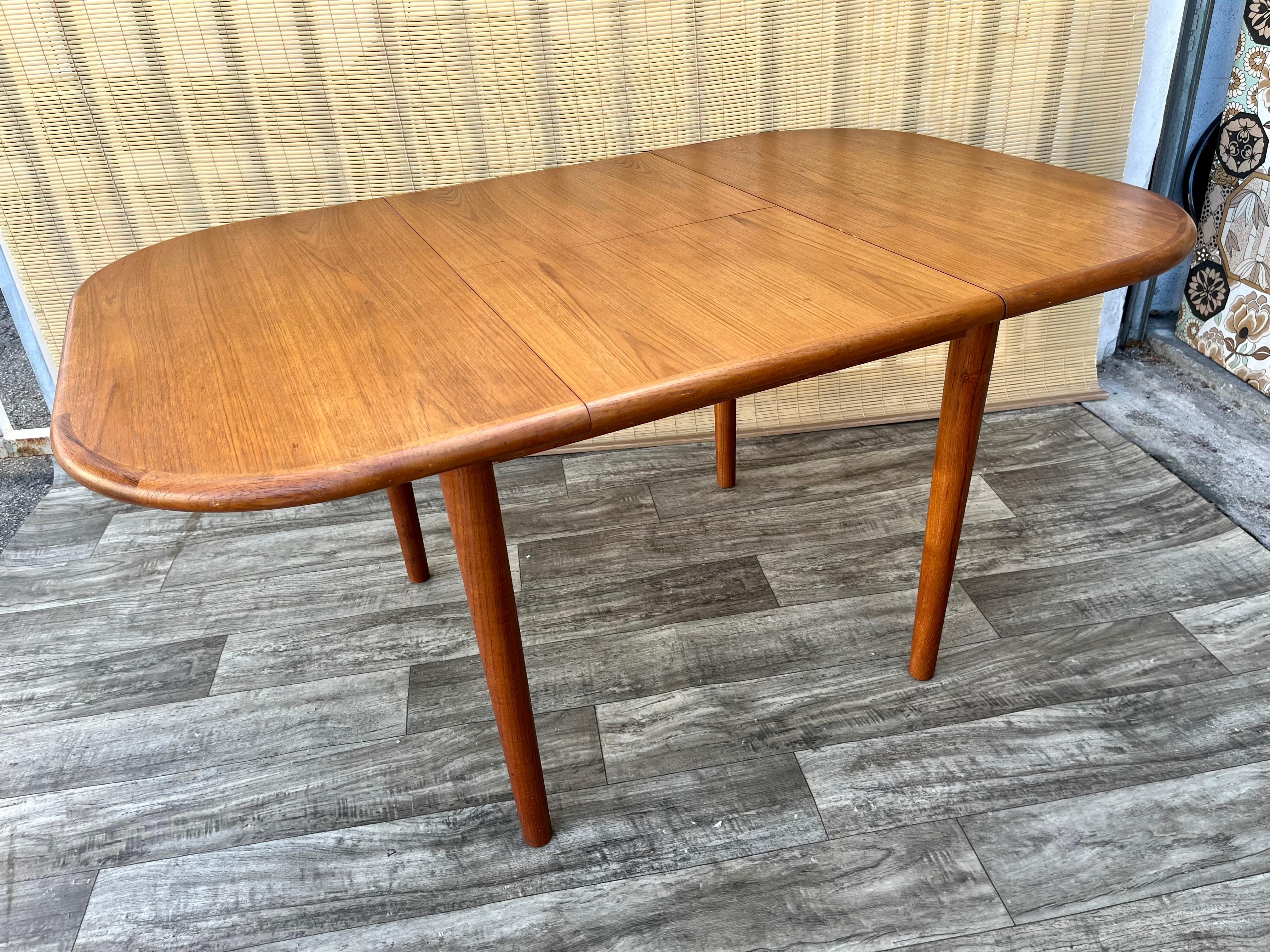 Mid Century Danish Modern Style Teak Extendable Dining Table. Circa 1970s 1