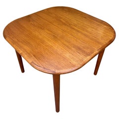 Mid Century Danish Modern Style Teak Extendable Dining Table. Circa 1970s