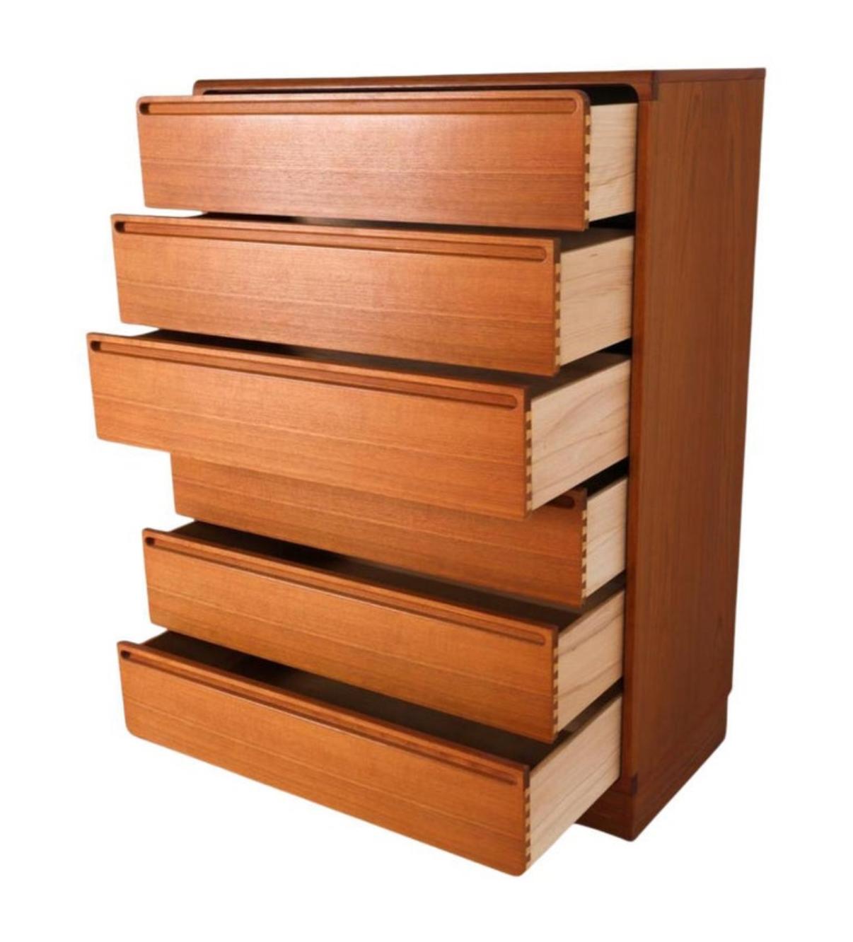 Danish Mid century danish modern tall teak dresser by Nils Johnson
