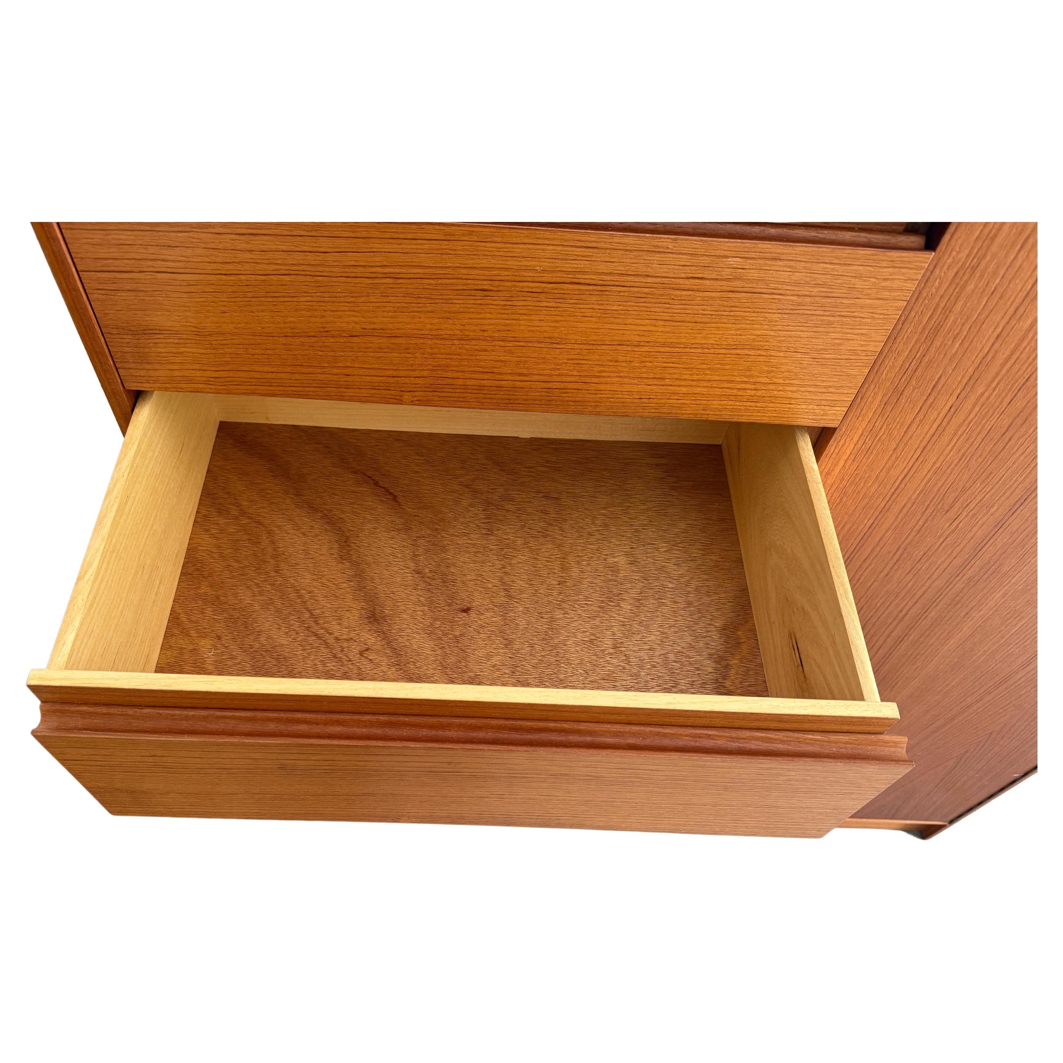 Mid century Danish modern tall wide Teak Dresser Wardrobe Clean Nordisk In Good Condition For Sale In Brooklyn, NY
