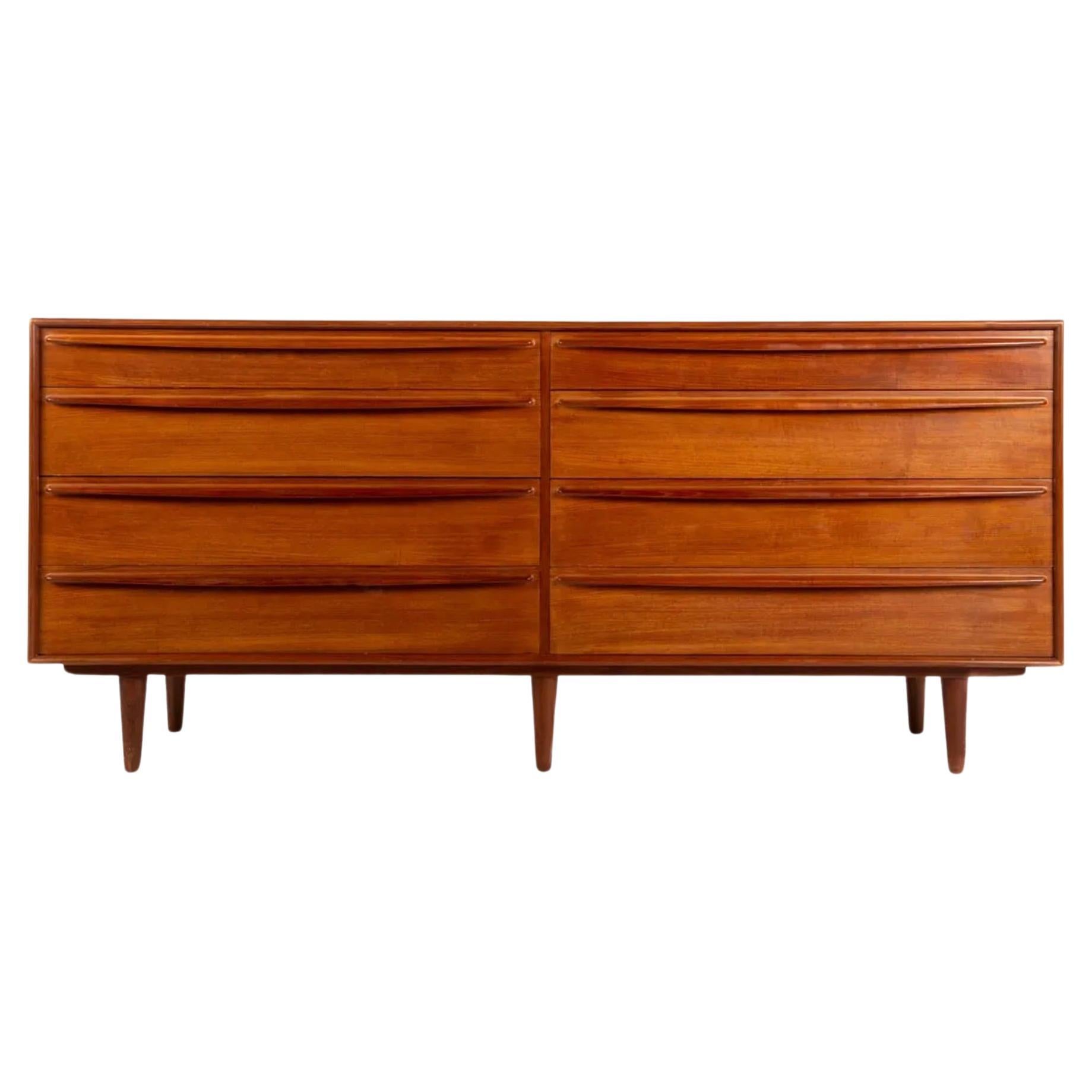 Mid century danish modern teak 8 drawer dresser with sculpted handles  For Sale
