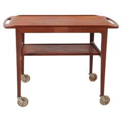 Carrello da bar in teak danese moderno di metà secolo con piano d'appoggio sollevabile