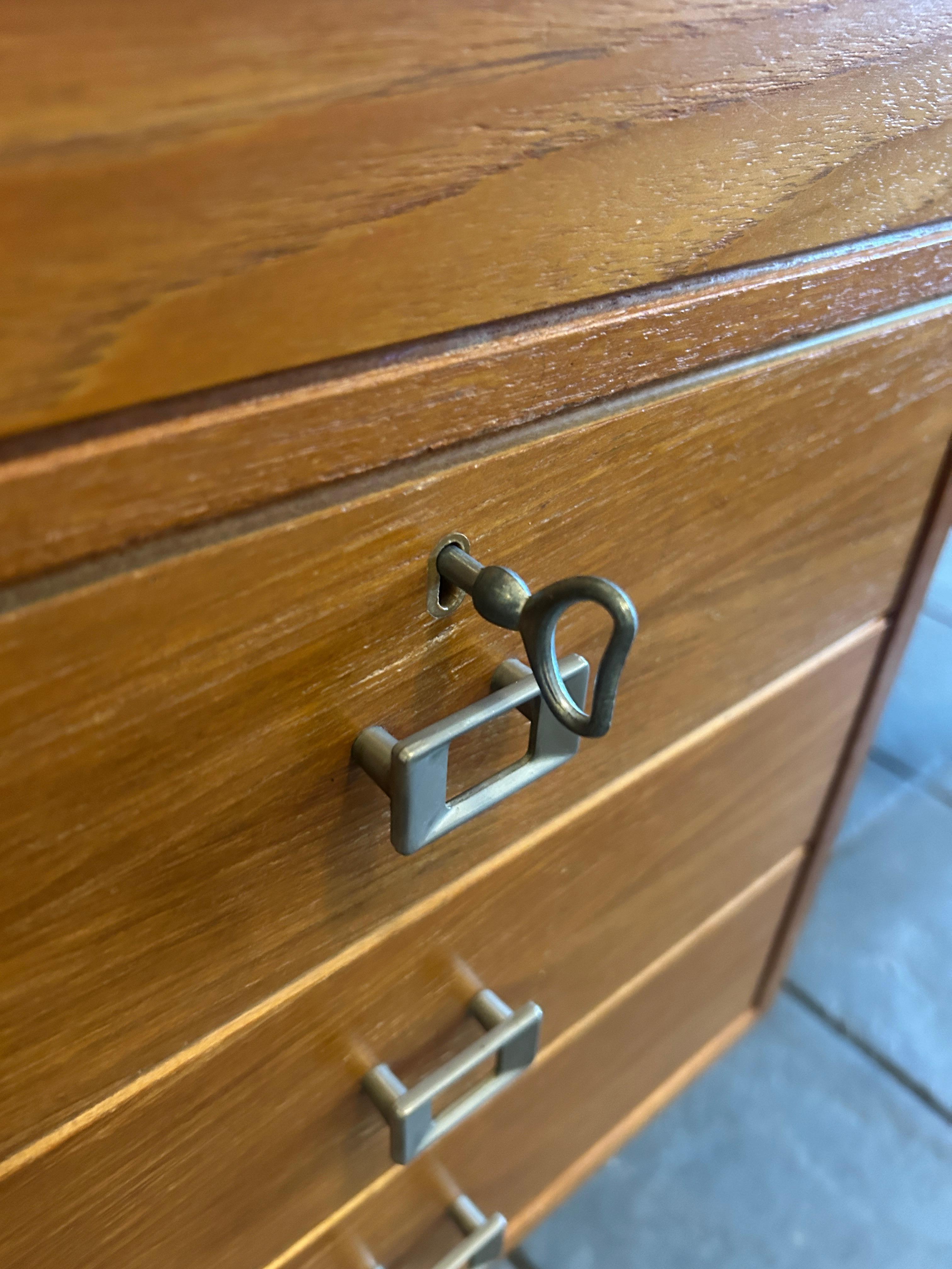 Mid century Danish modern teak desk with nickel handles with key For Sale 2