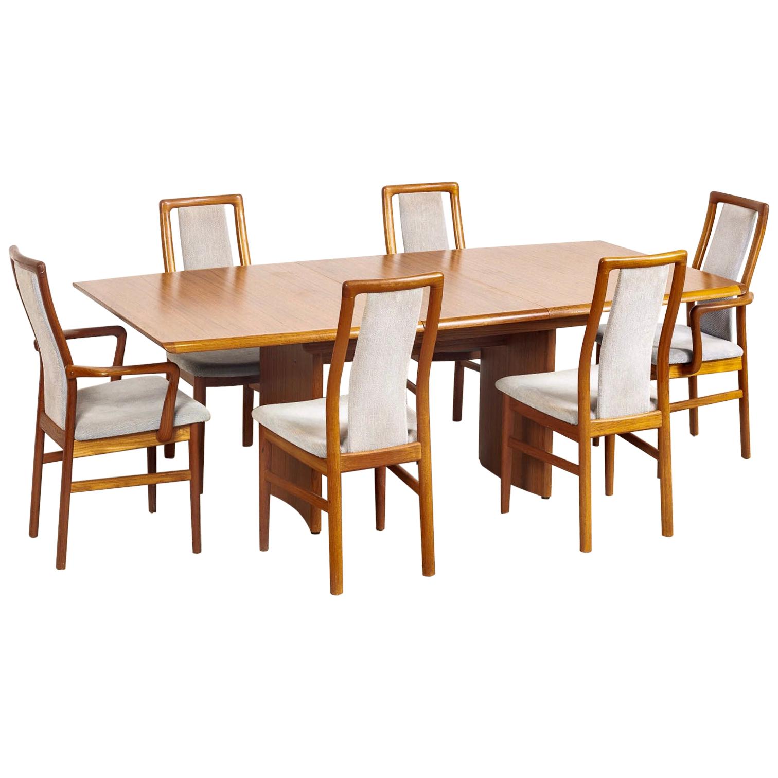 Mid-Century Danish Modern Teak Dining Set with Dining Table and 6 Dining Chairs For Sale