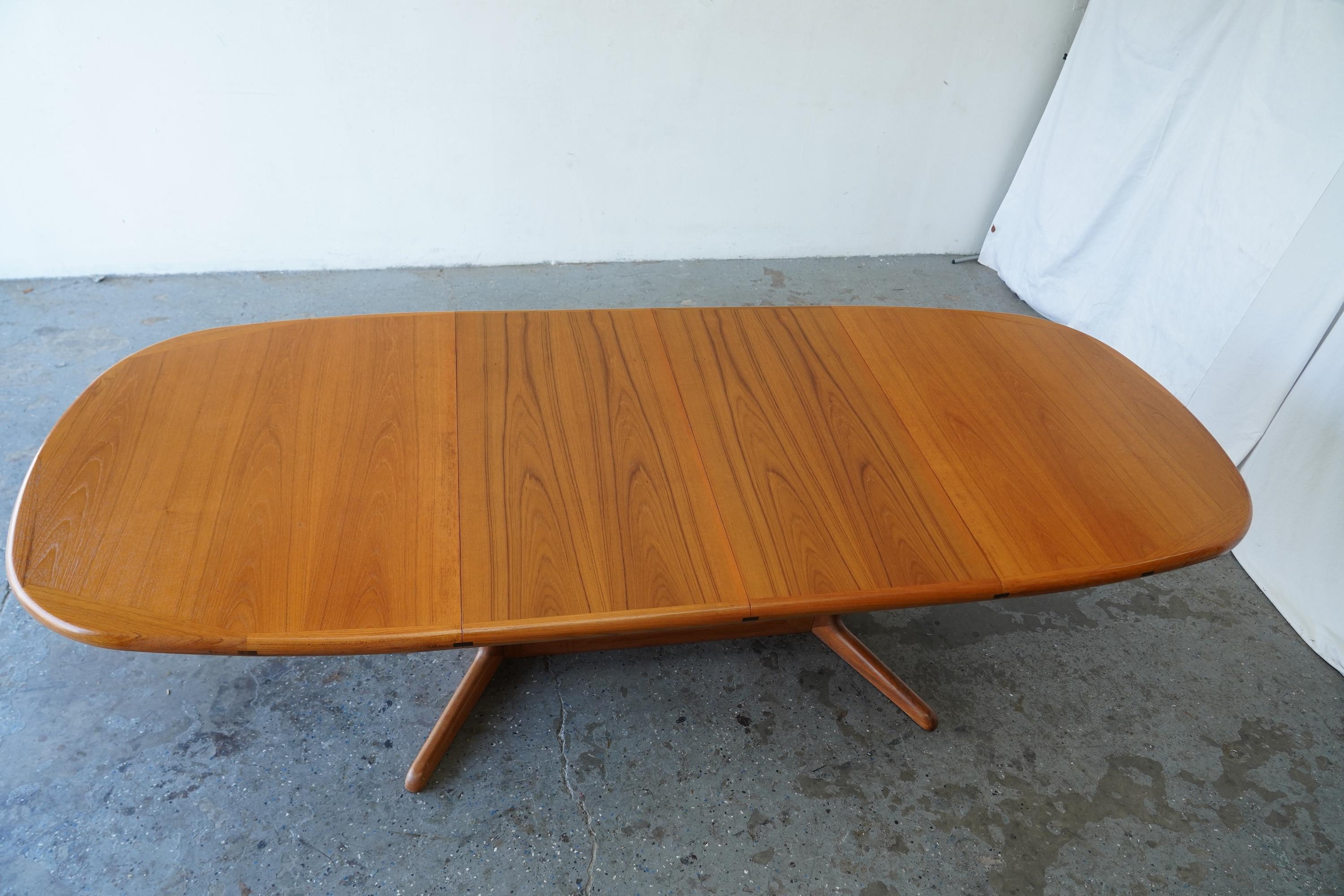This timeless teak dining table by Benny Linden embodies the elegance and practicality of Danish Modern design. Its clean lines and warm teak finish make it versatile enough to suit both mid-century inspired interiors and contemporary mixed modern