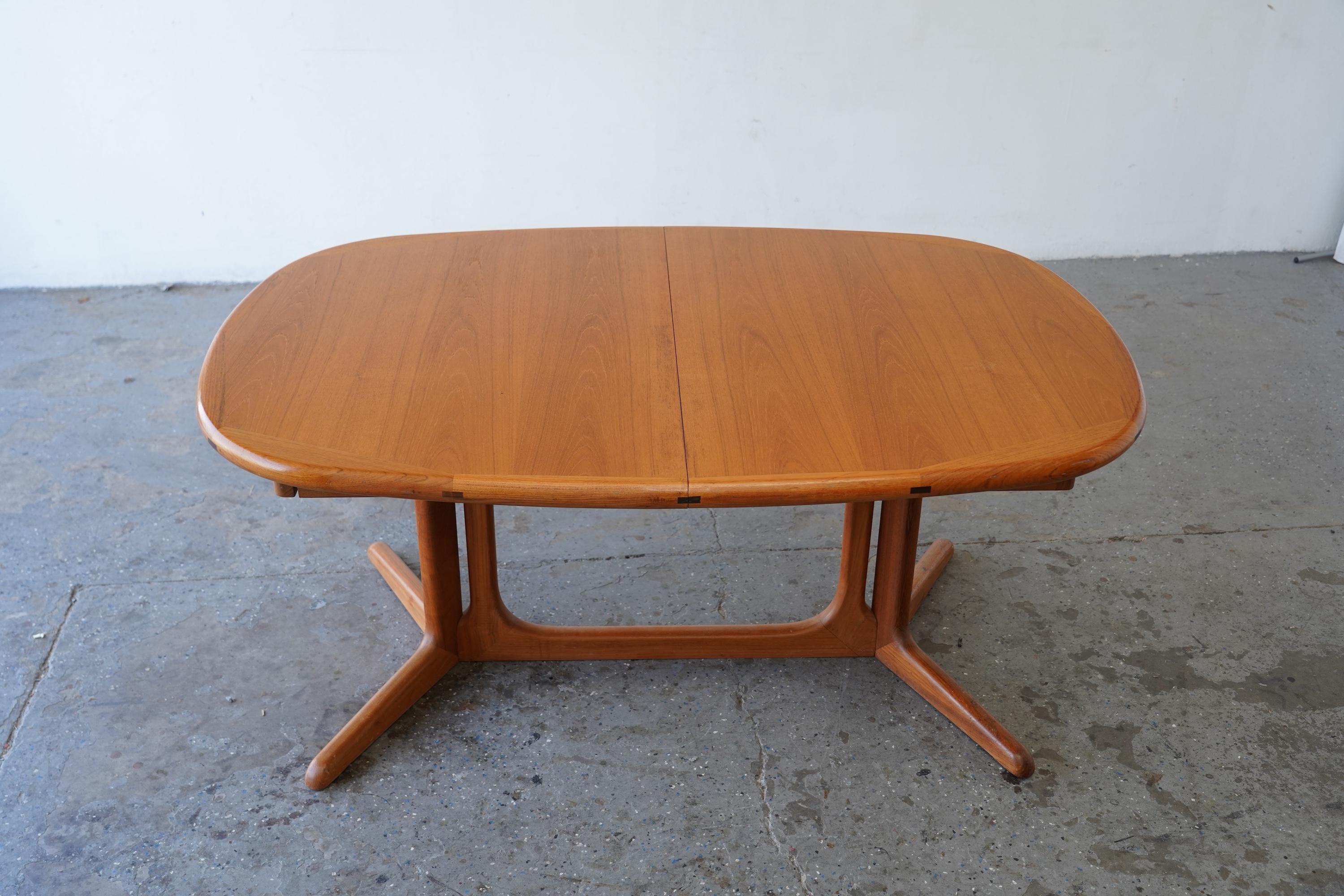 Scandinavian Modern Mid-Century Danish Modern Teak Dining Table by Benny Linden with Two Leaves For Sale