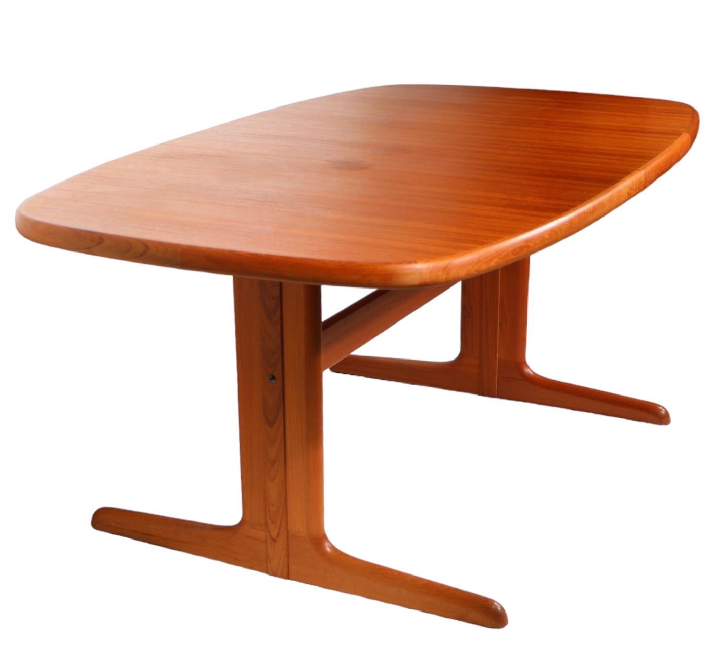 Mid Century Danish Modern Teak Dining Table with 2 Leaves c. 1960/1970's 9