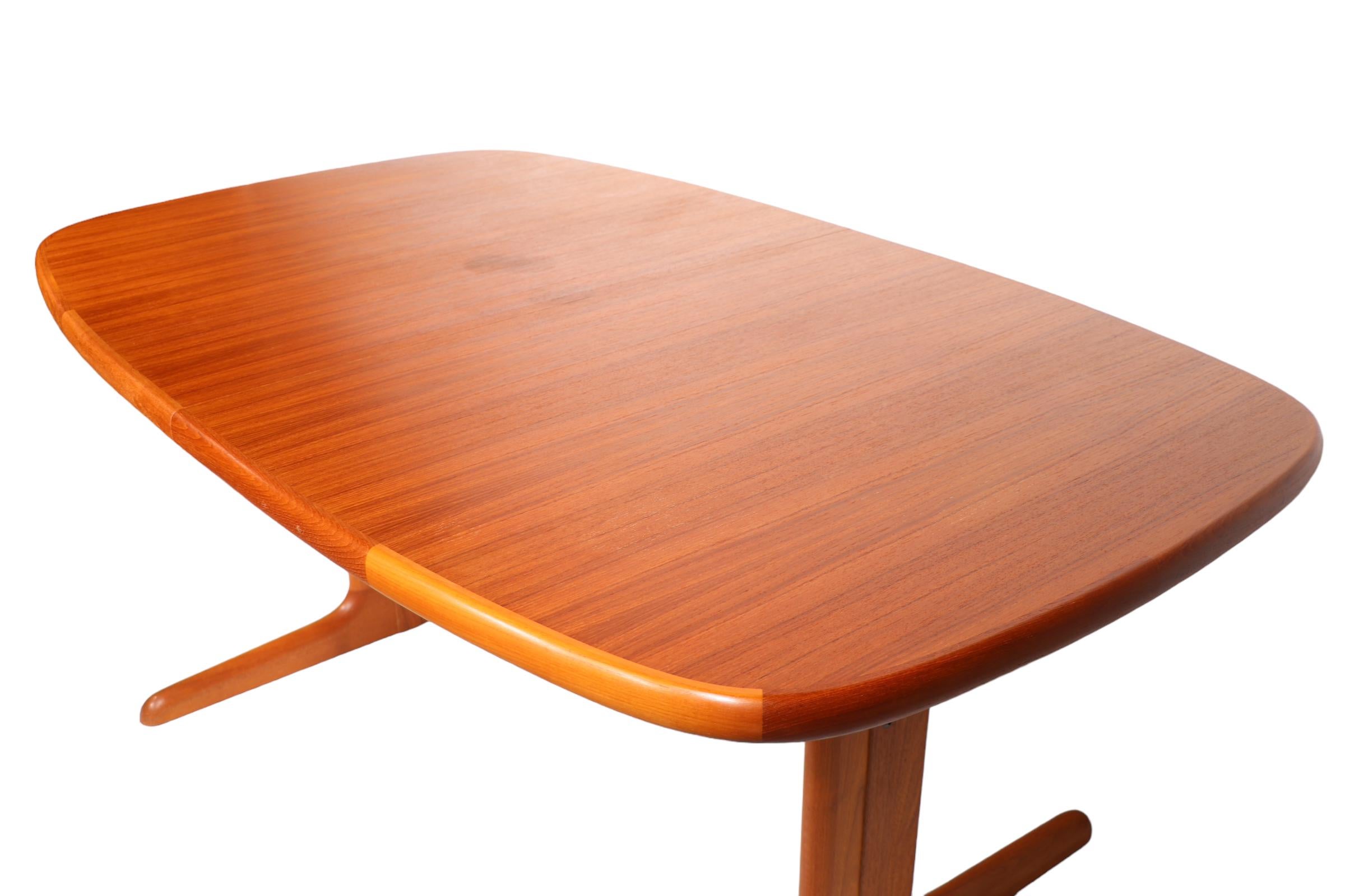 Mid Century Danish Modern Teak Dining Table with 2 Leaves c. 1960/1970's 11