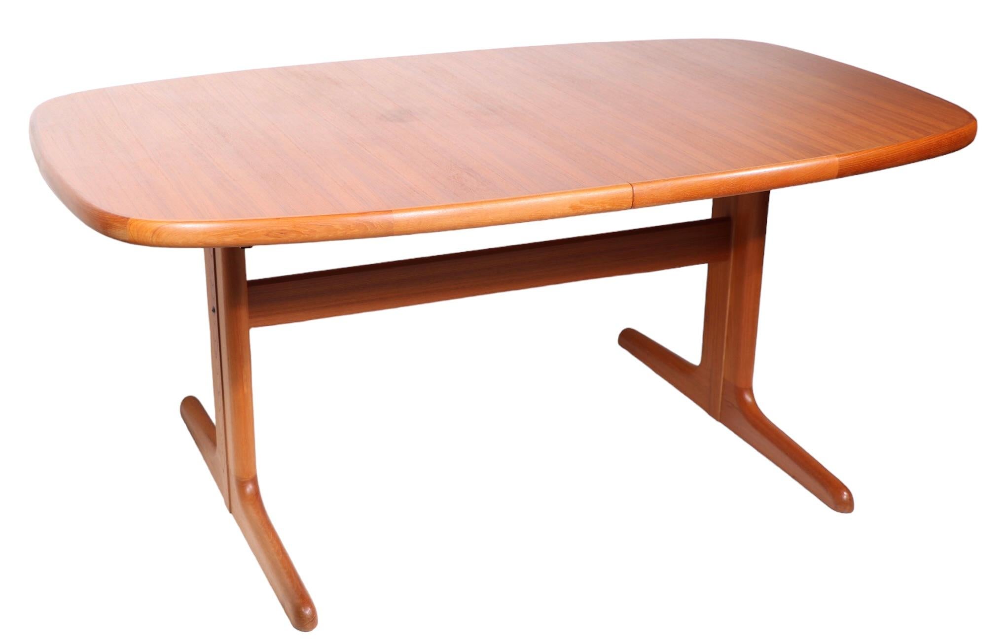 Mid Century Danish Modern Teak Dining Table with 2 Leaves c. 1960/1970's 15