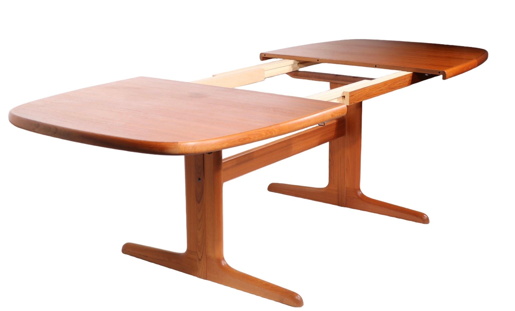 Mid Century Danish Modern Teak Dining Table with 2 Leaves c. 1960/1970's 2