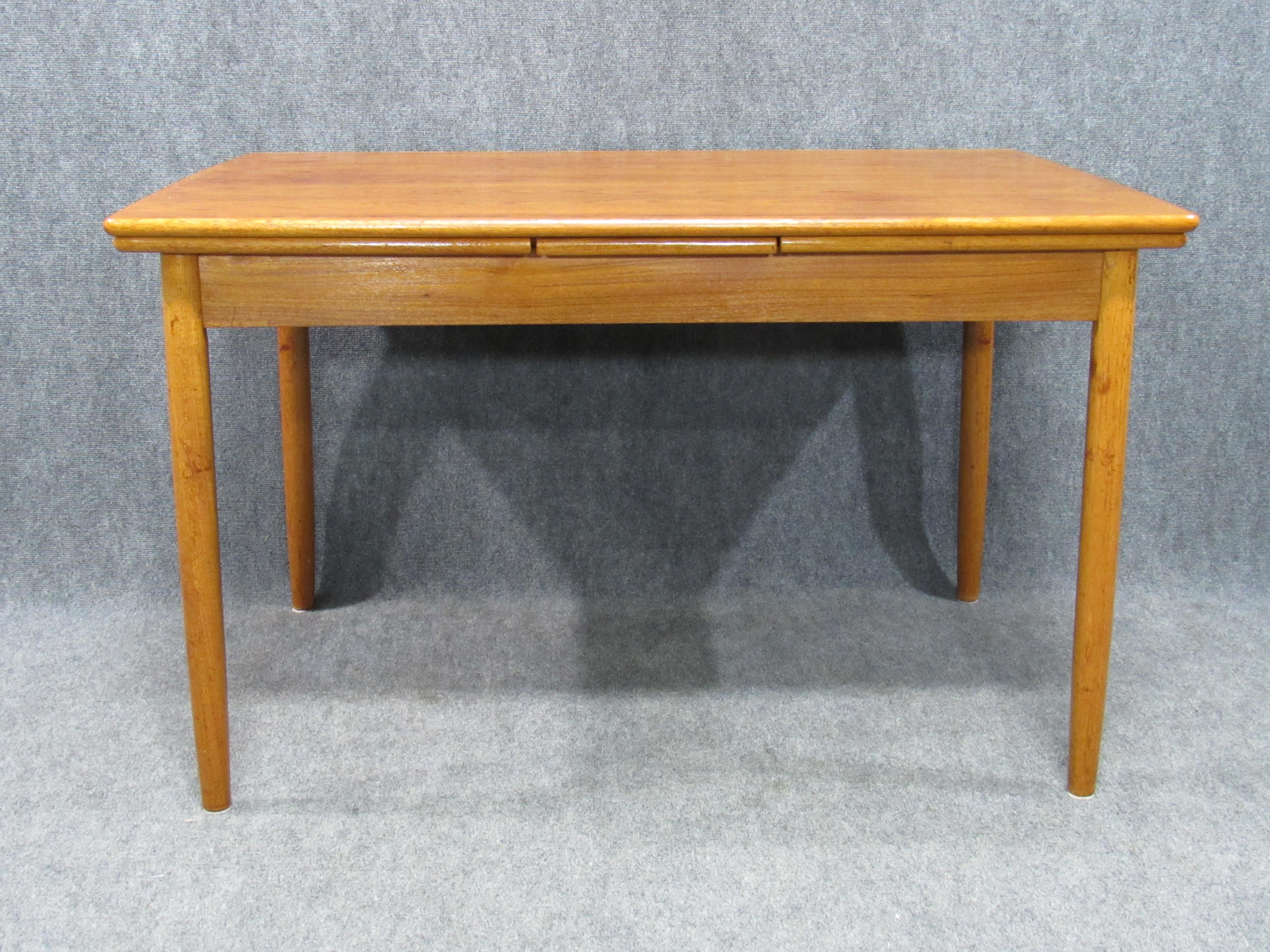 Mid-Century Modern Midcentury Danish Modern Teak Dining Table with Two Pull-Out Leaves