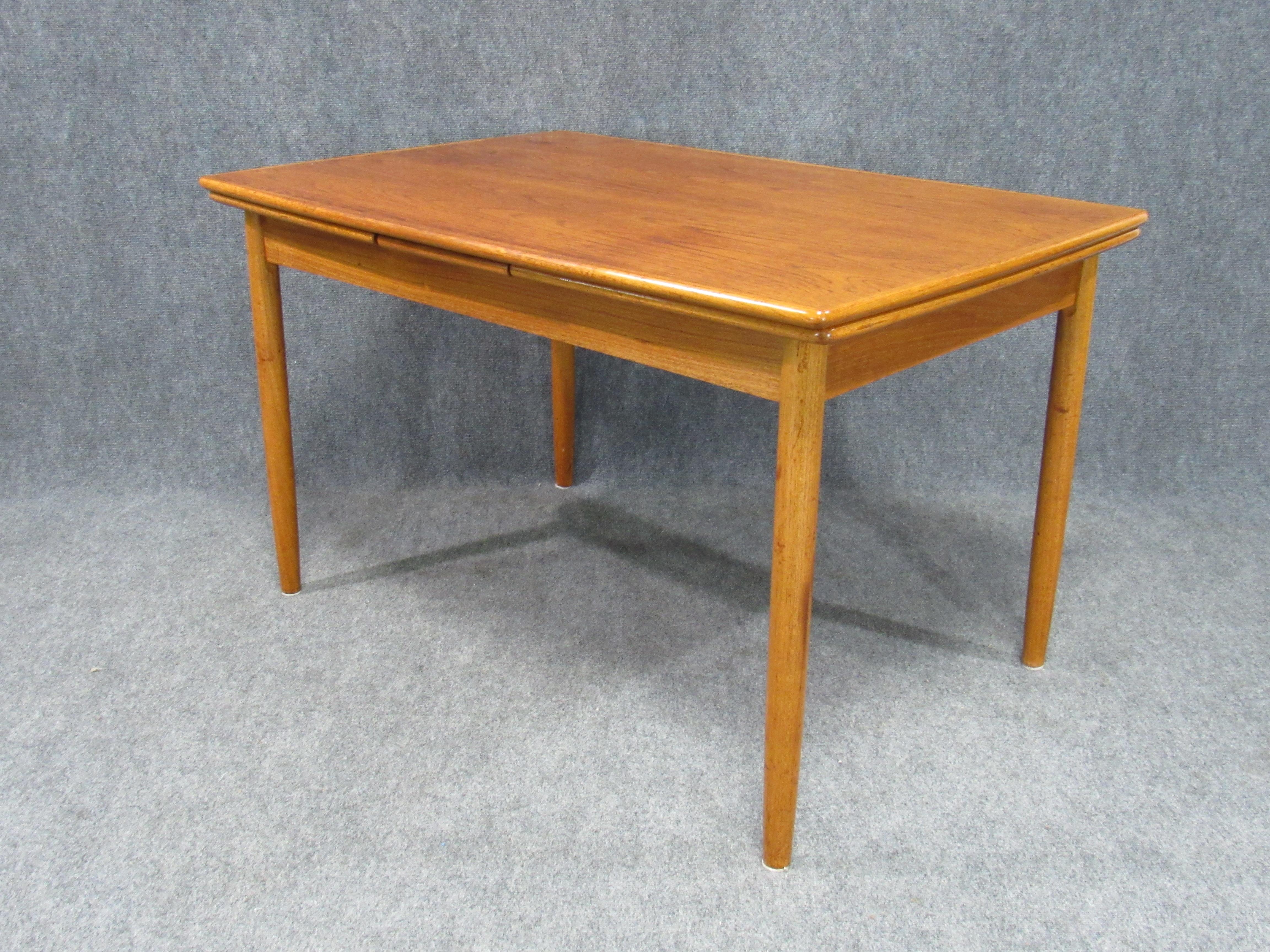Midcentury Danish Modern Teak Dining Table with Two Pull-Out Leaves In Good Condition In Belmont, MA