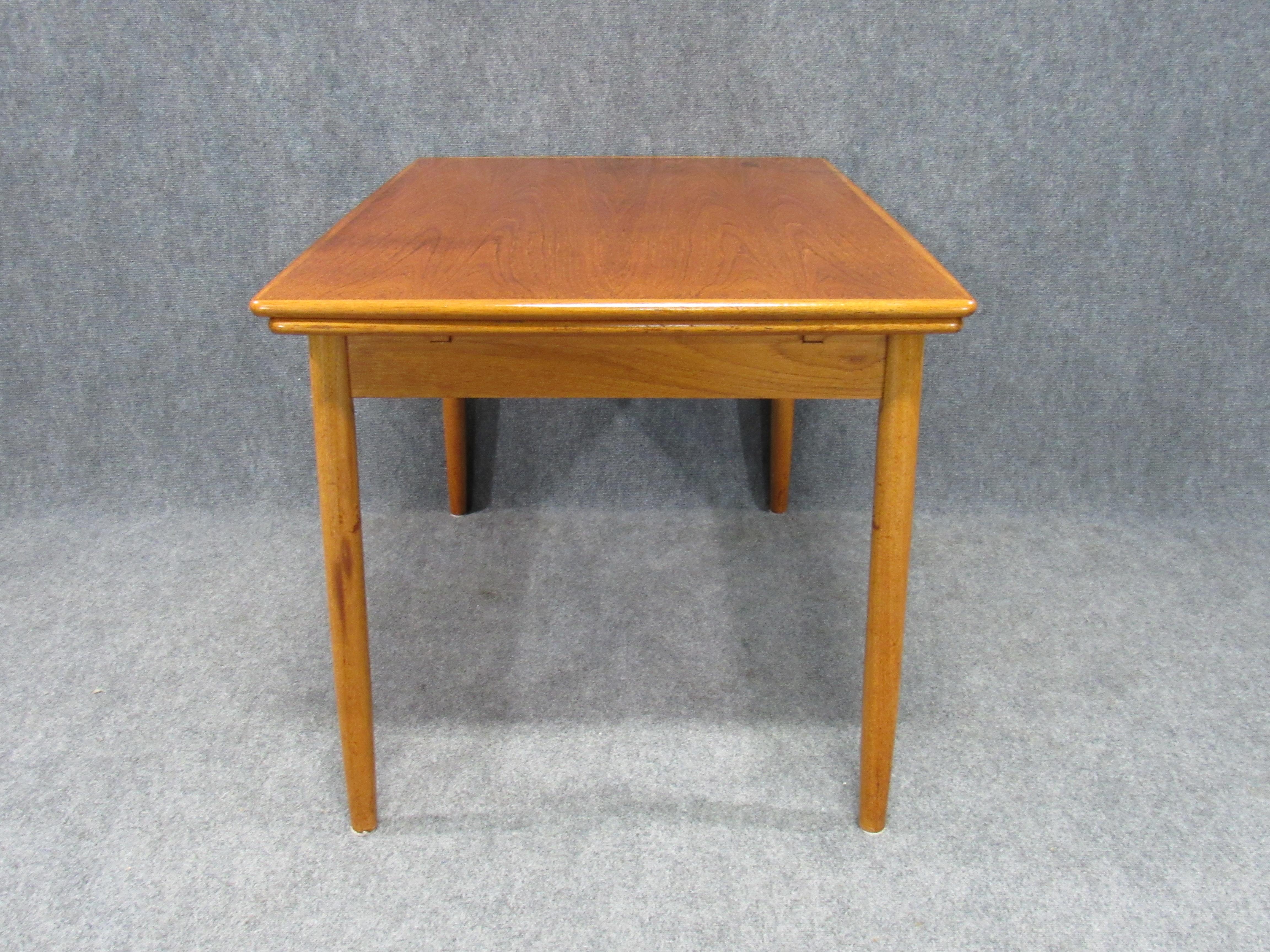 Mid-20th Century Midcentury Danish Modern Teak Dining Table with Two Pull-Out Leaves