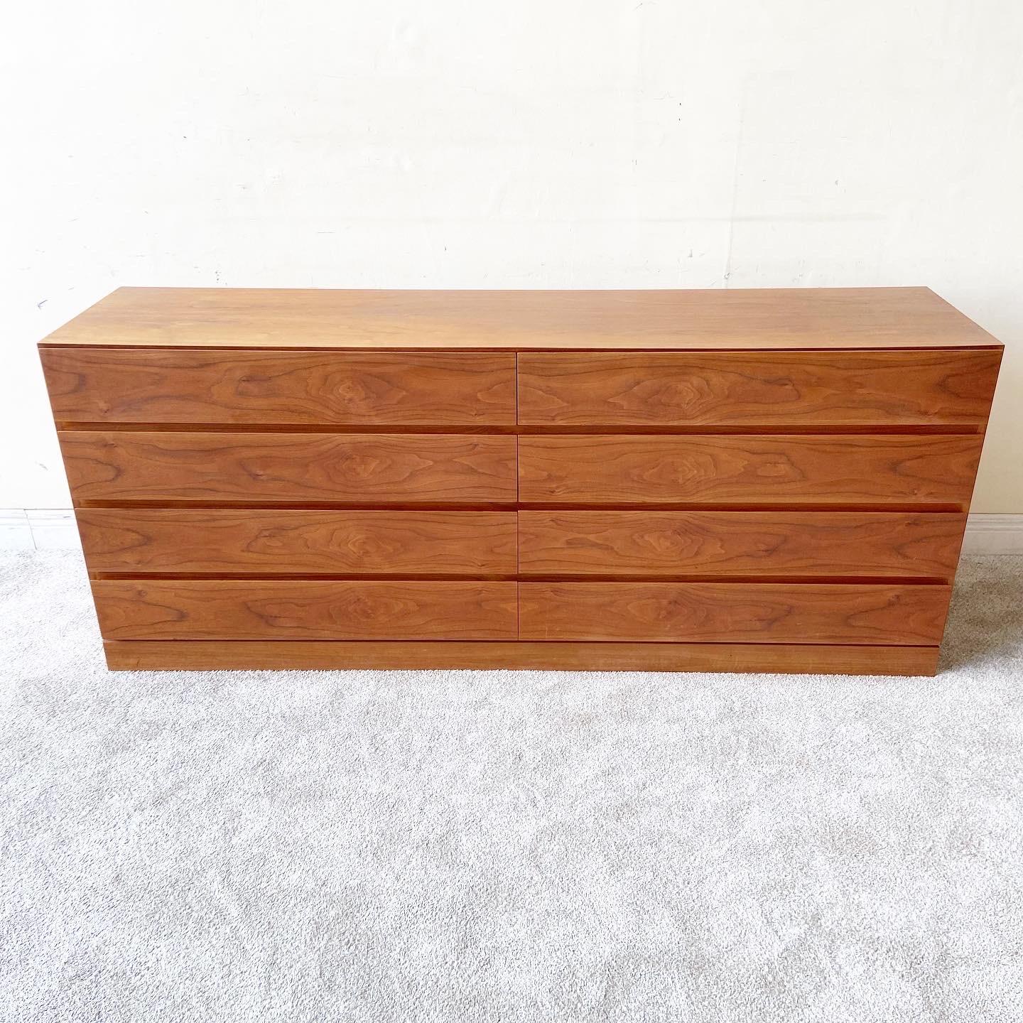 Exceptional mid century Danish modern 8 drawer lowboy dresser by Arne Wahl Iverson for Vinde Mobelfabrik. Features 8 spacious drawers with all original finish.