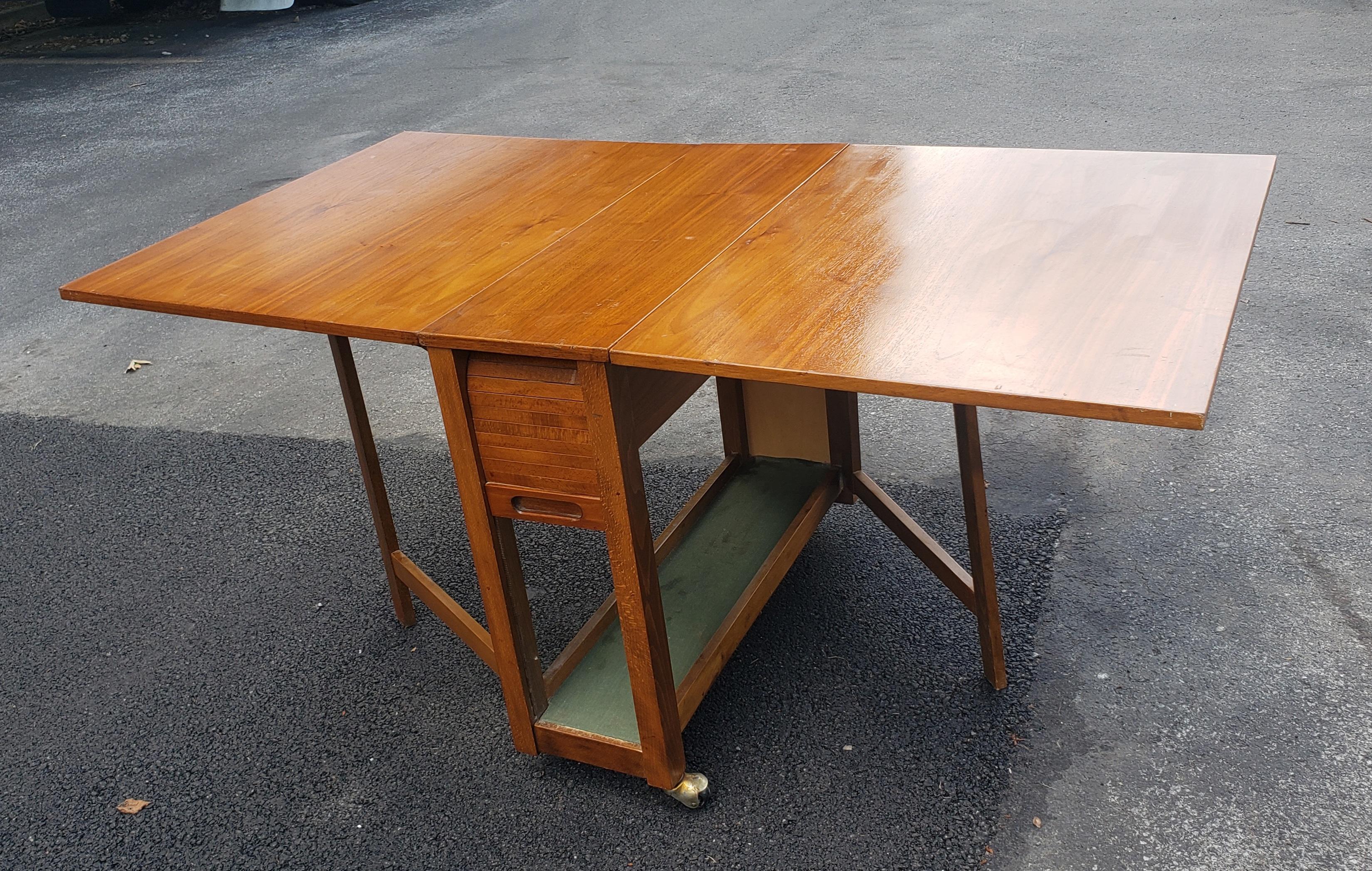 Mid-Century Danish Modern Teak Drop-Leaf Dining Table with Storage on Rollers For Sale 1