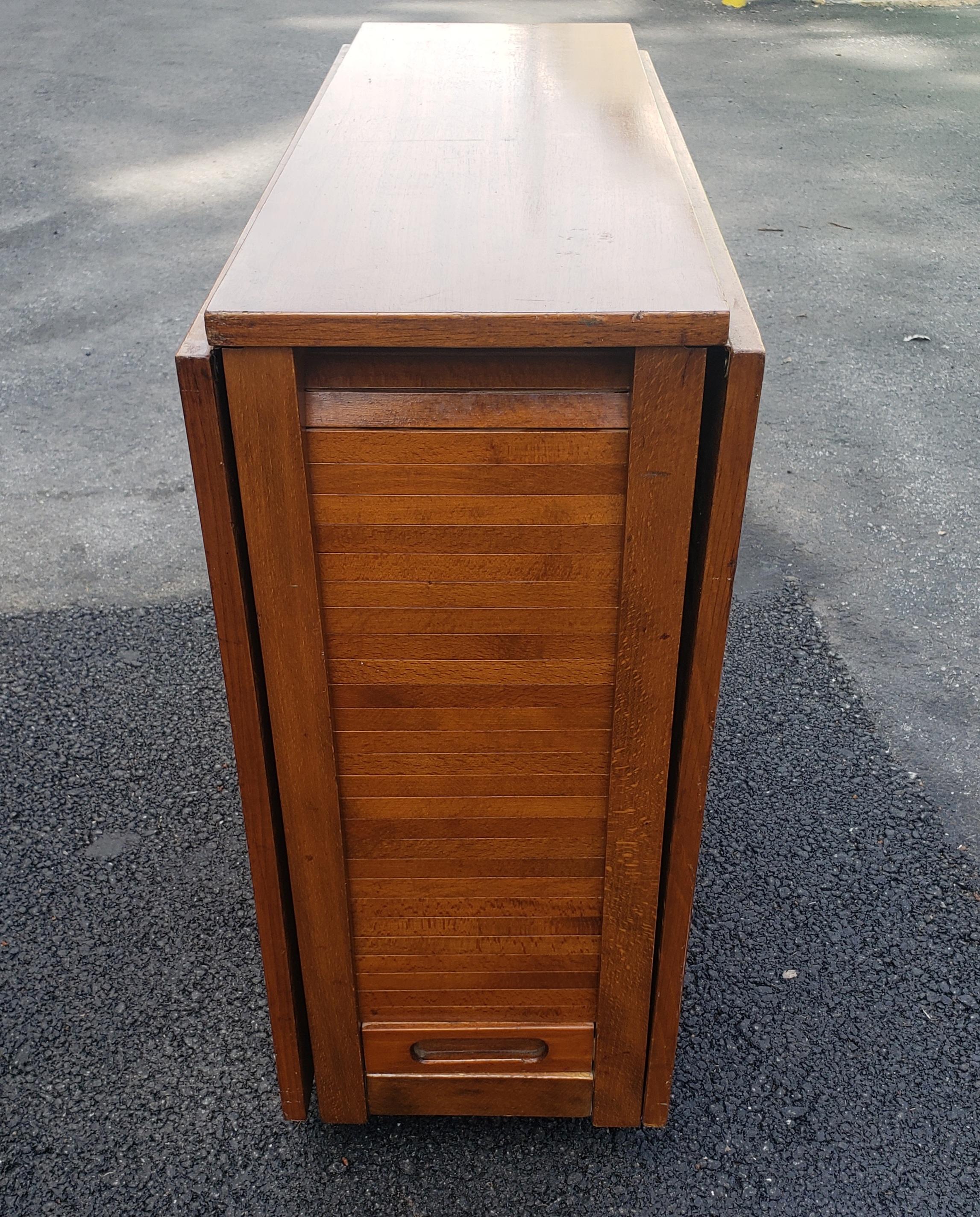 Mid-Century Danish Modern Teak Drop-Leaf Dining Table with Storage on Rollers For Sale 6