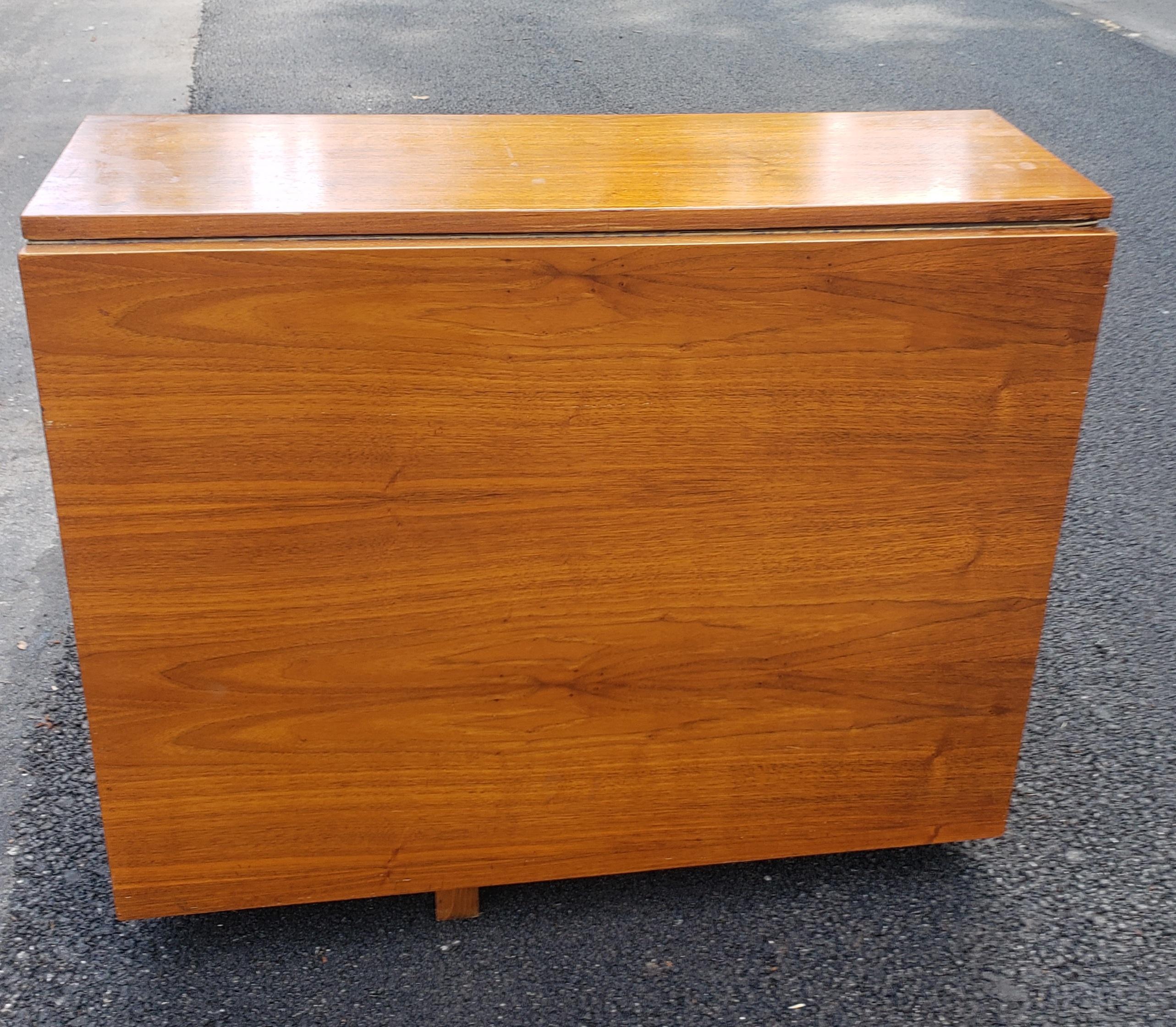 Mid-Century Danish Modern Teak Drop-Leaf Dining Table with Storage on Rollers For Sale 10