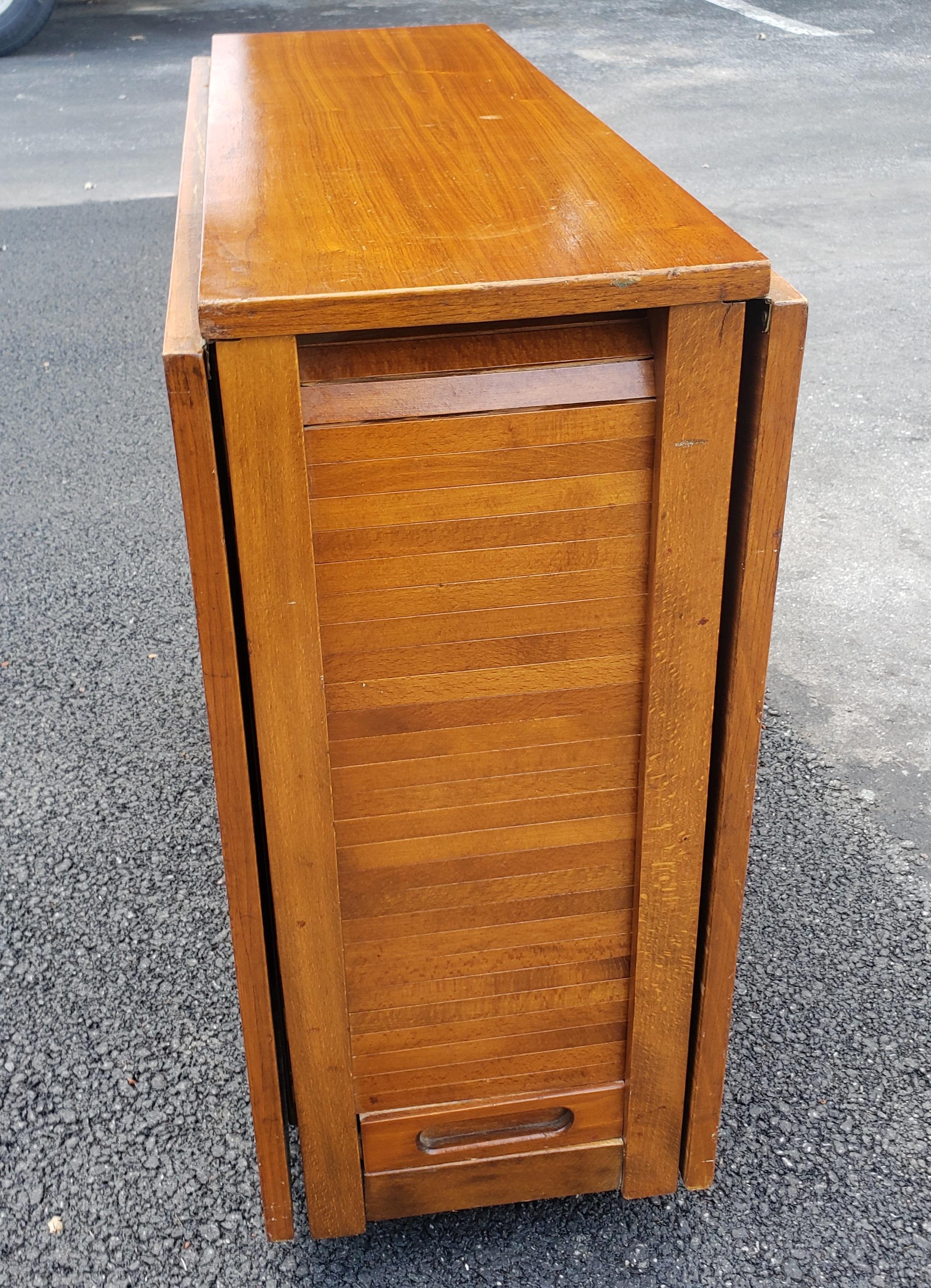 Mid-Century Danish Modern Teak Drop-Leaf Dining Table with Storage on Rollers For Sale 9