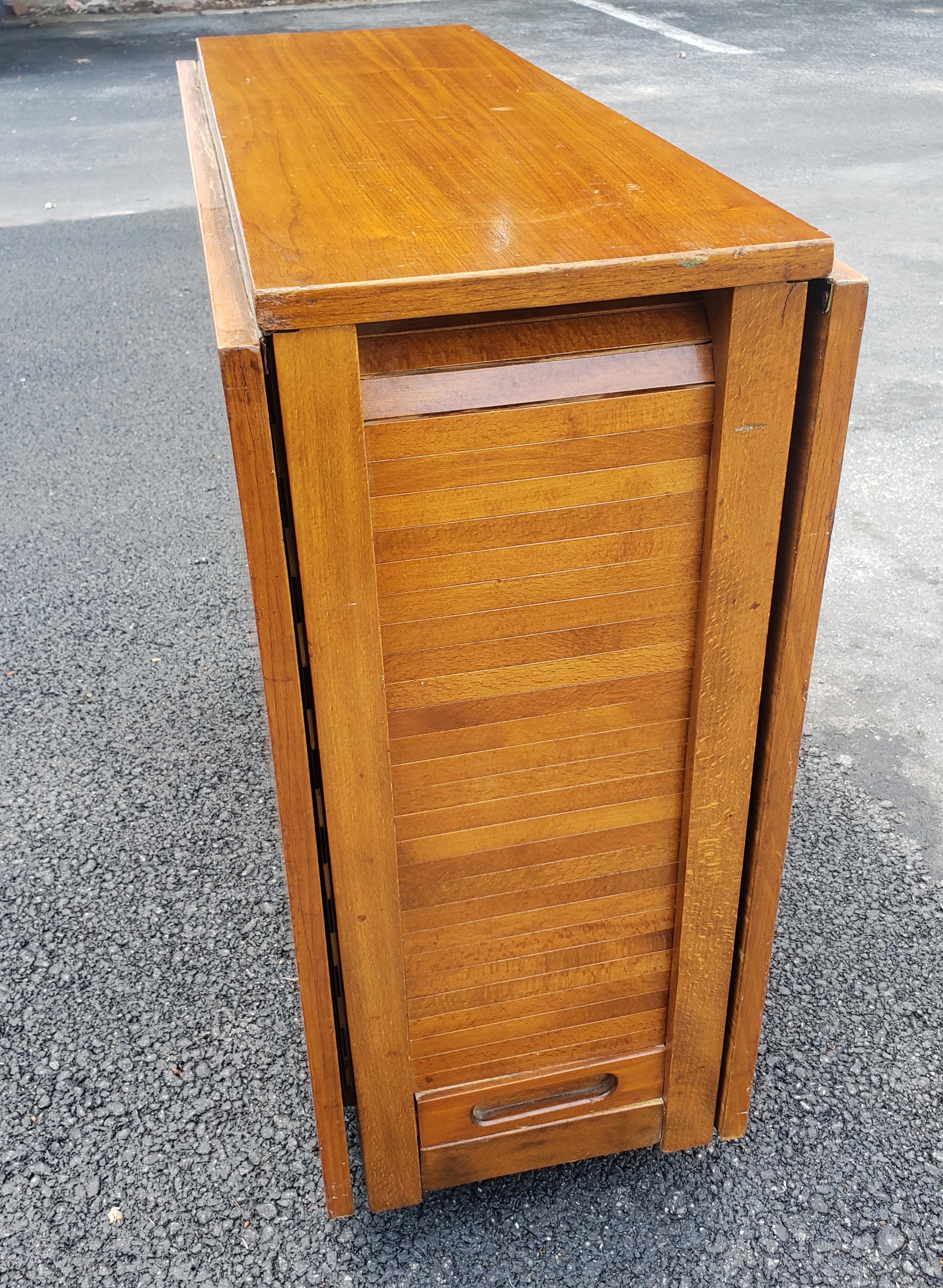 Mid-Century Danish Modern Teak Drop-Leaf Dining Table with Storage on Rollers For Sale 12
