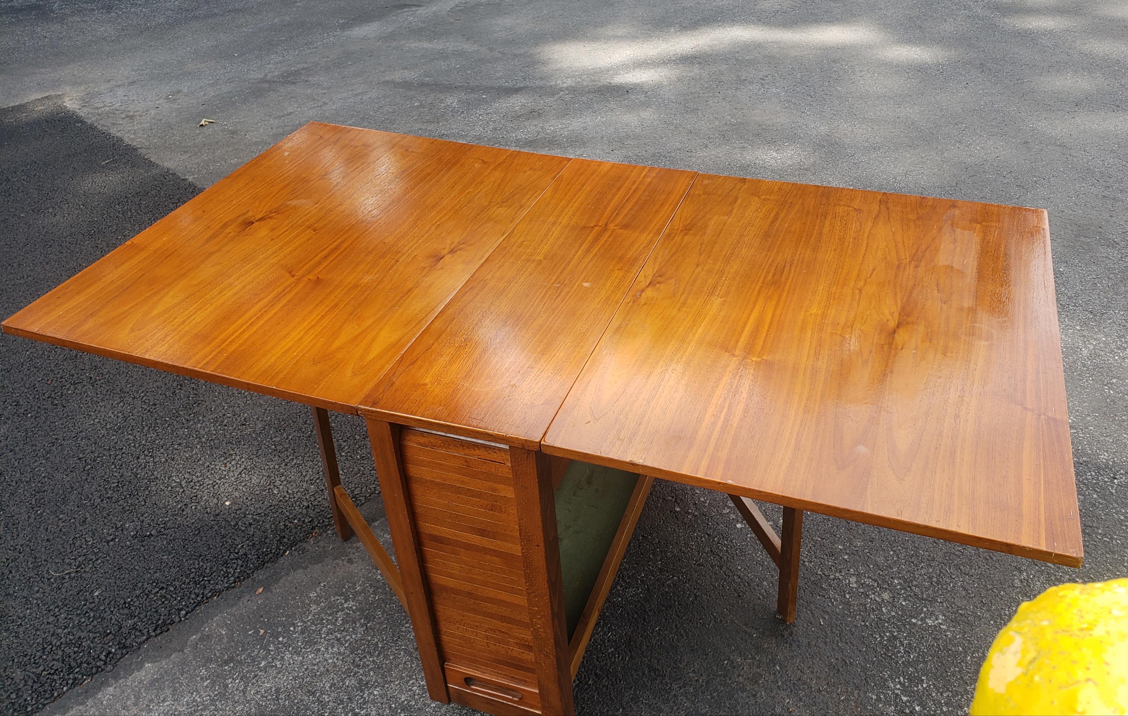 Adam Style Mid-Century Danish Modern Teak Drop-Leaf Dining Table with Storage on Rollers For Sale