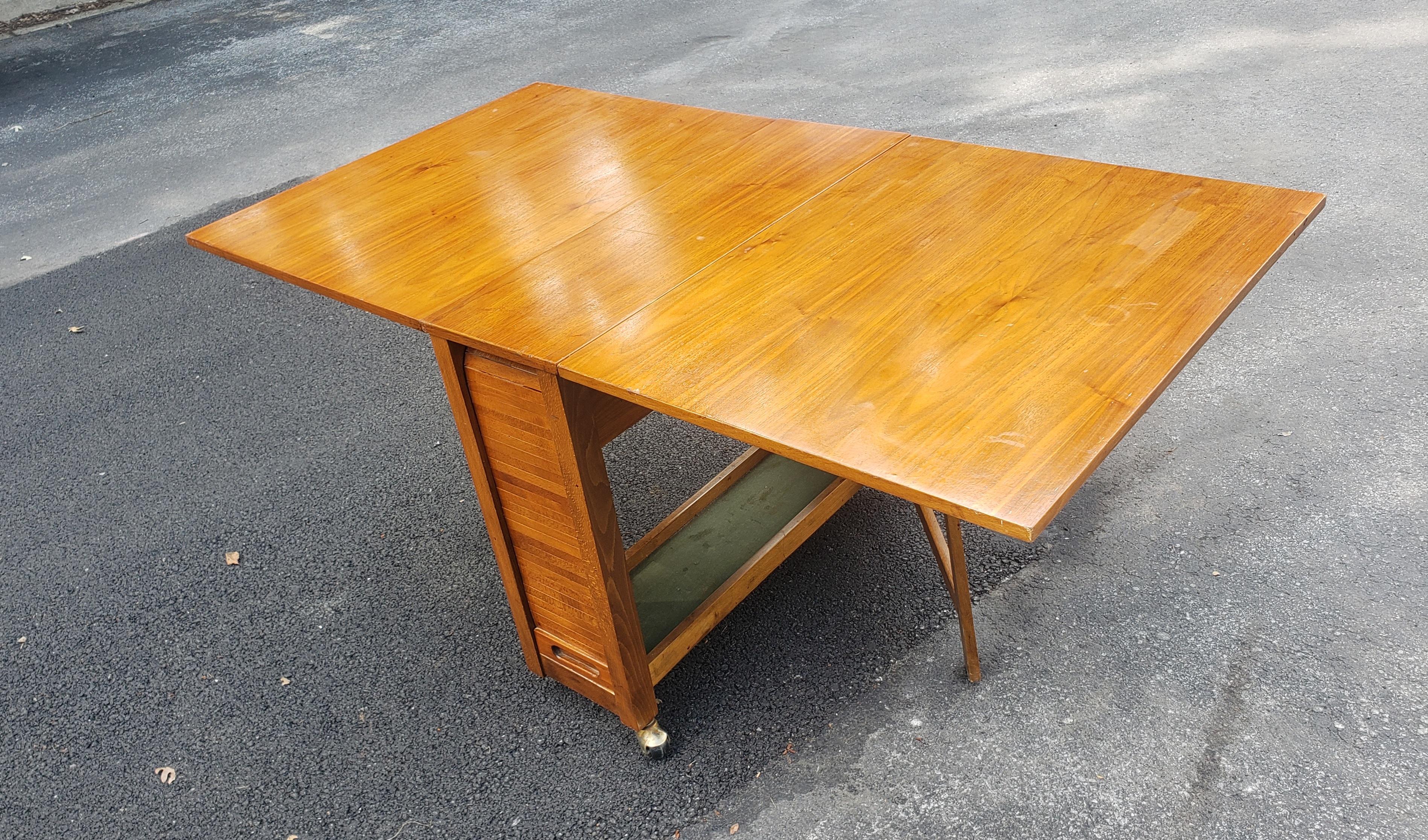 Stained Mid-Century Danish Modern Teak Drop-Leaf Dining Table with Storage on Rollers For Sale
