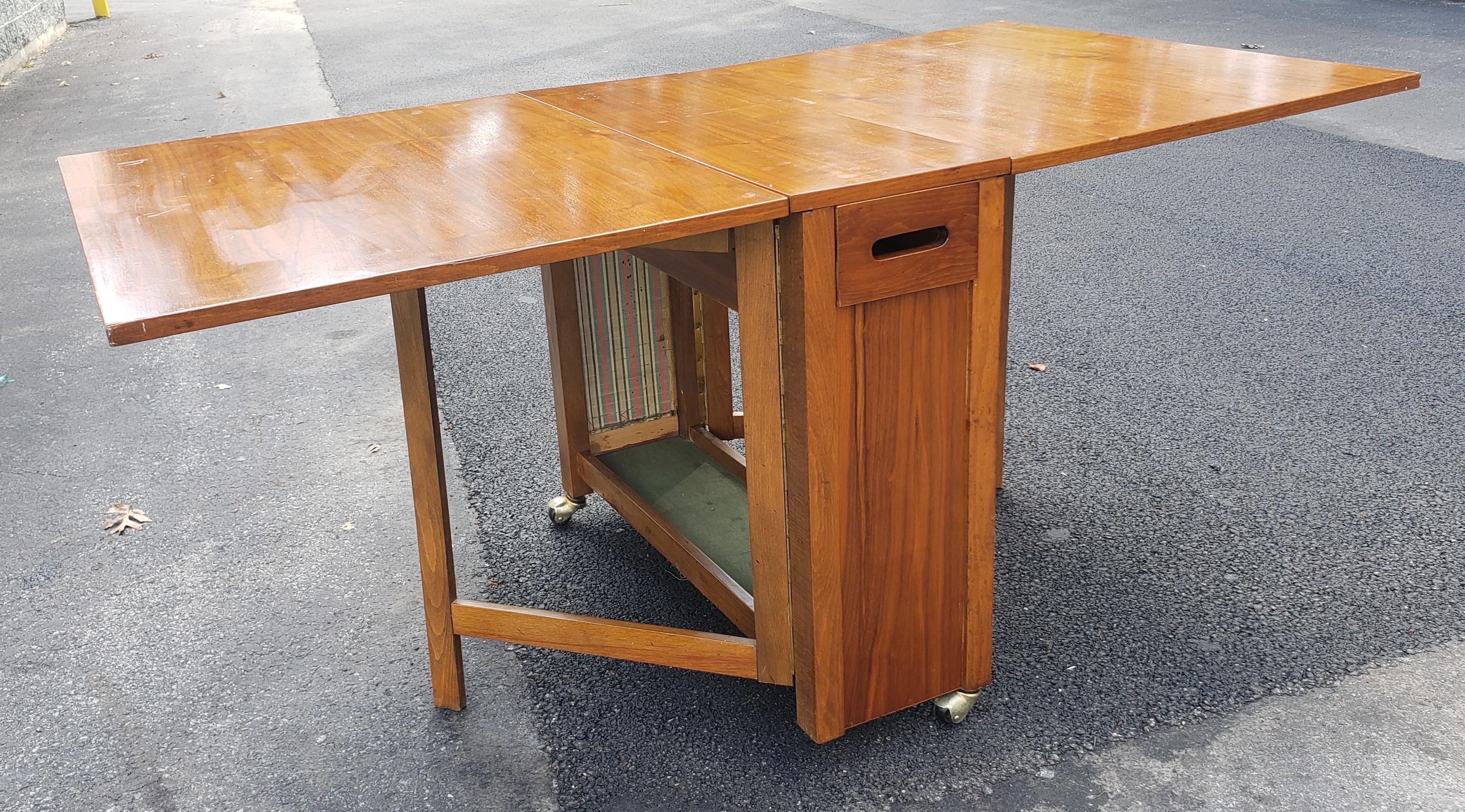 Mid-Century Danish Modern Teak Drop-Leaf Dining Table with Storage on Rollers In Good Condition For Sale In Germantown, MD