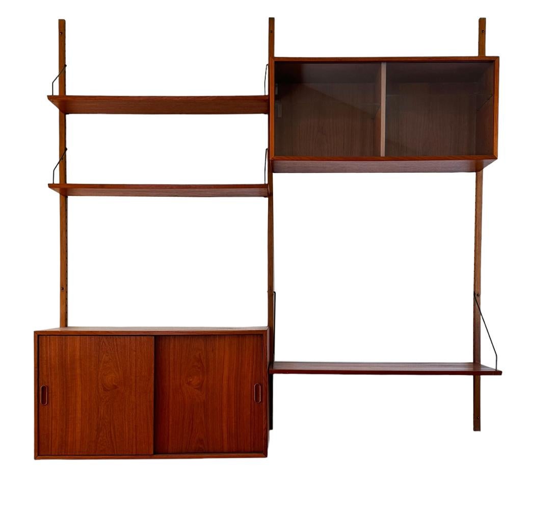 Mid Century Danish Modern Teak Floating Shelves Cado Wall Unit by Poul Cadovius In Good Condition For Sale In Philadelphia, PA
