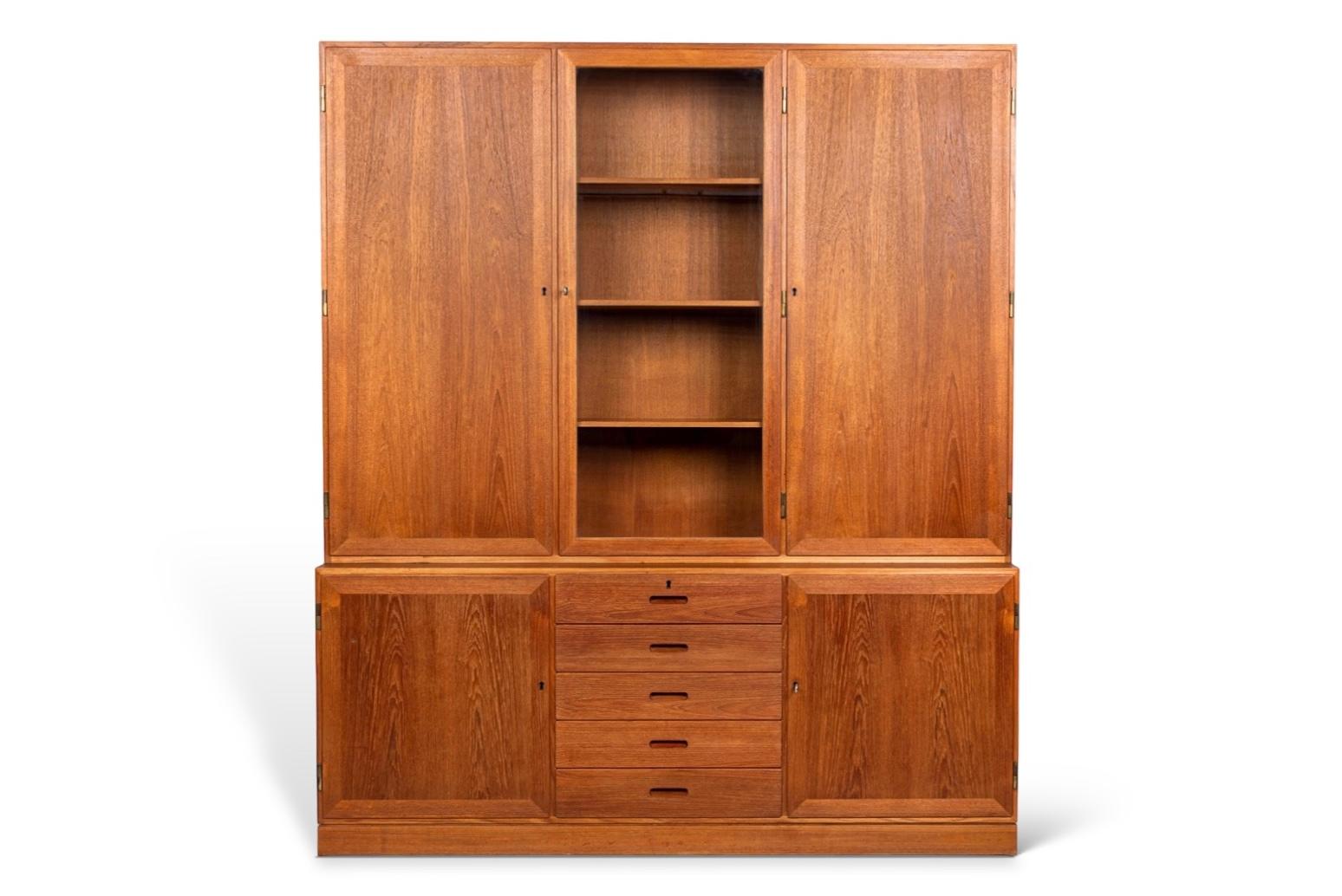 This exceptional step-back teak wood china cabinet or 