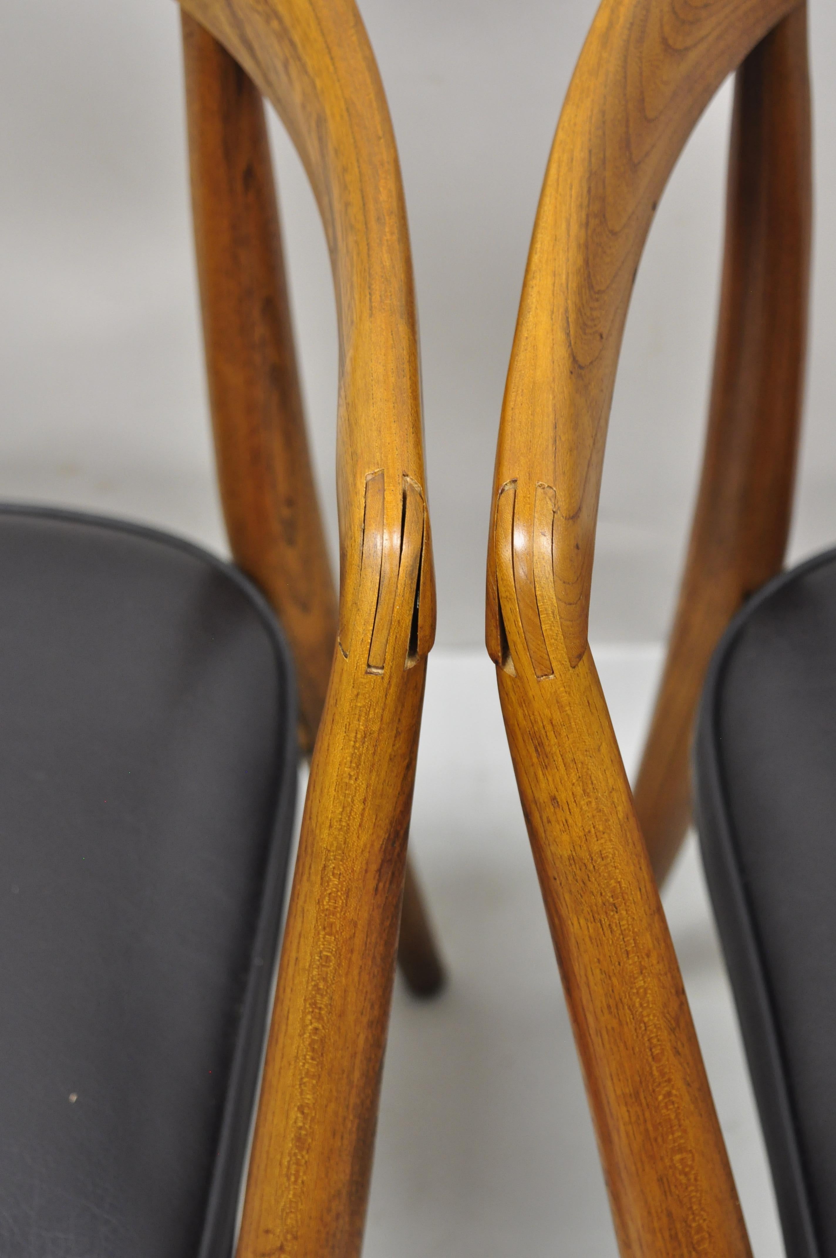 Mid-20th Century Mid Century Danish Modern Teak John Stuart Horseshoe Dining Arm Chair, a Pair