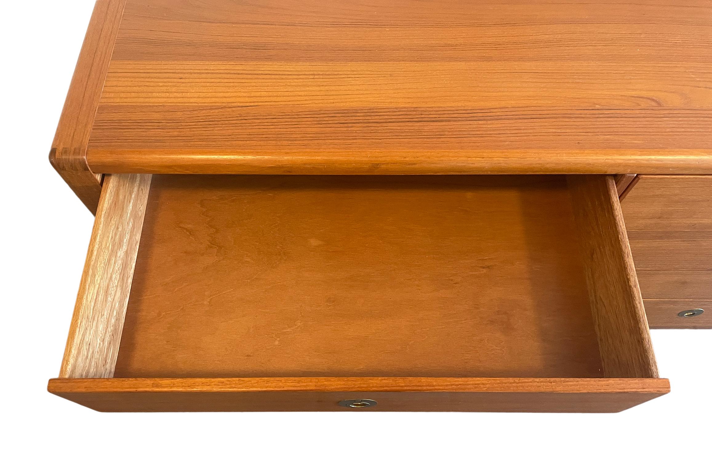 Woodwork Mid-Century Danish Modern Teak Low 8 Drawer Dresser with Brass Finger Pulls For Sale