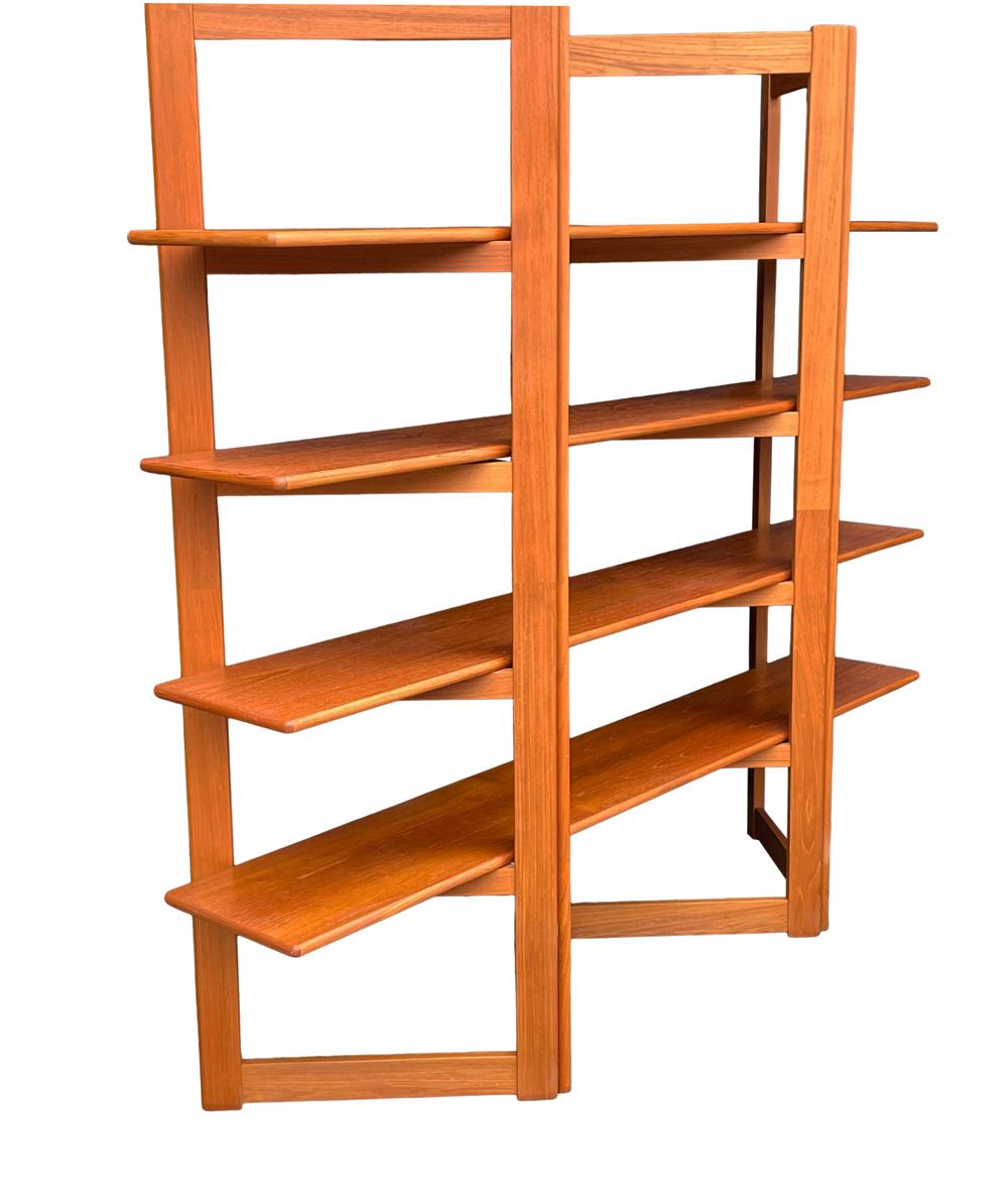 A very cool versatile piece from Denmark circa 1980s. It features all teak construction with tons of storage space to display books or nick nacks.