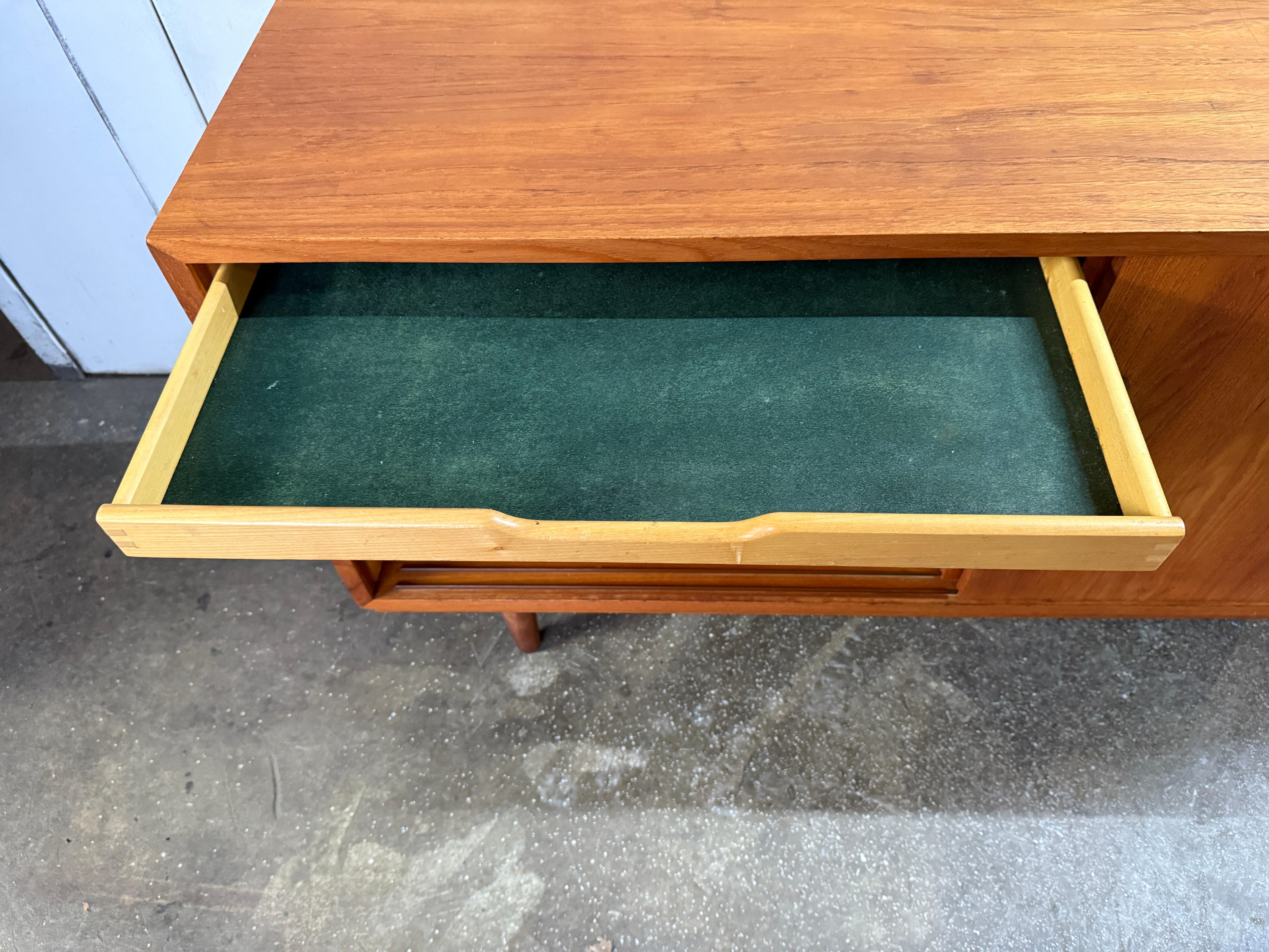 Mid-20th Century Mid century Danish Modern teak Sliding Door Credenza Sideboard on Tapered Legs