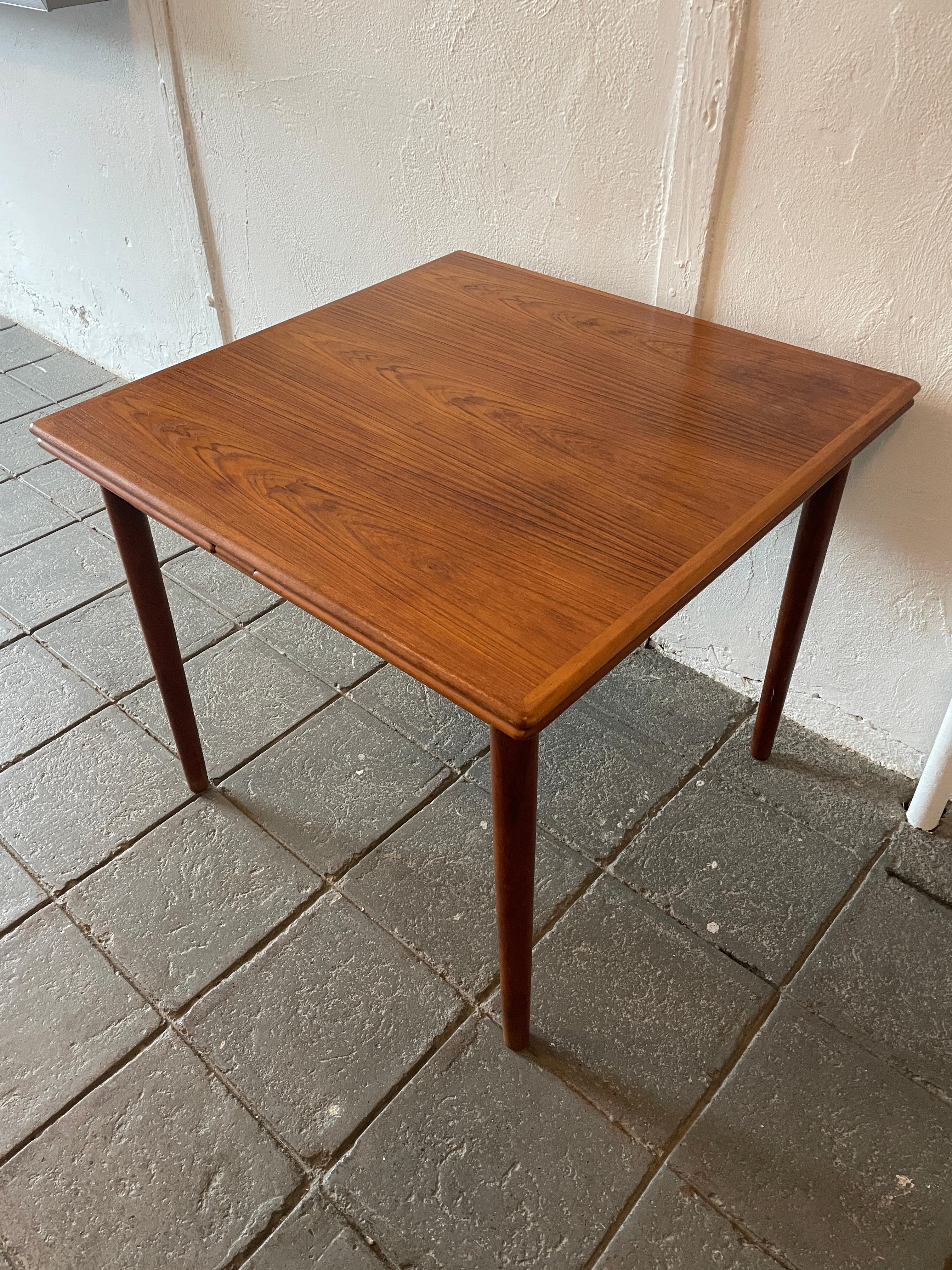 small teak dining table