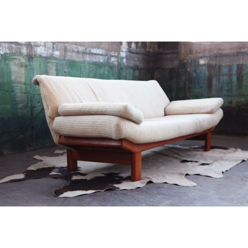 Solid Teak frame Original Danish Mid Century Modern very long Gondola Sofa.

This design is pleasing to the eye and versatile in a Mid Century, Post Modern, as well as Modern decor. Perfect for a designer with the desire to customize this stunning