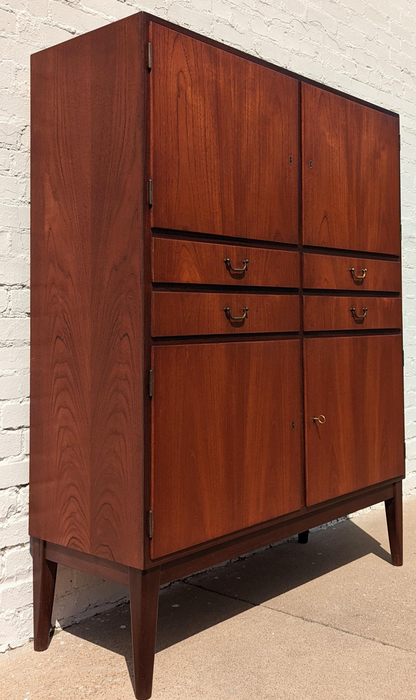 Mid Century Danish Modern Teak Tall Cabinet

Attributed to McIntosh. Above average vintage condition and structurally sound. Has some expected slight finish wear and scratching. Very well constructed. Outdoor listing pictures might appear slightly