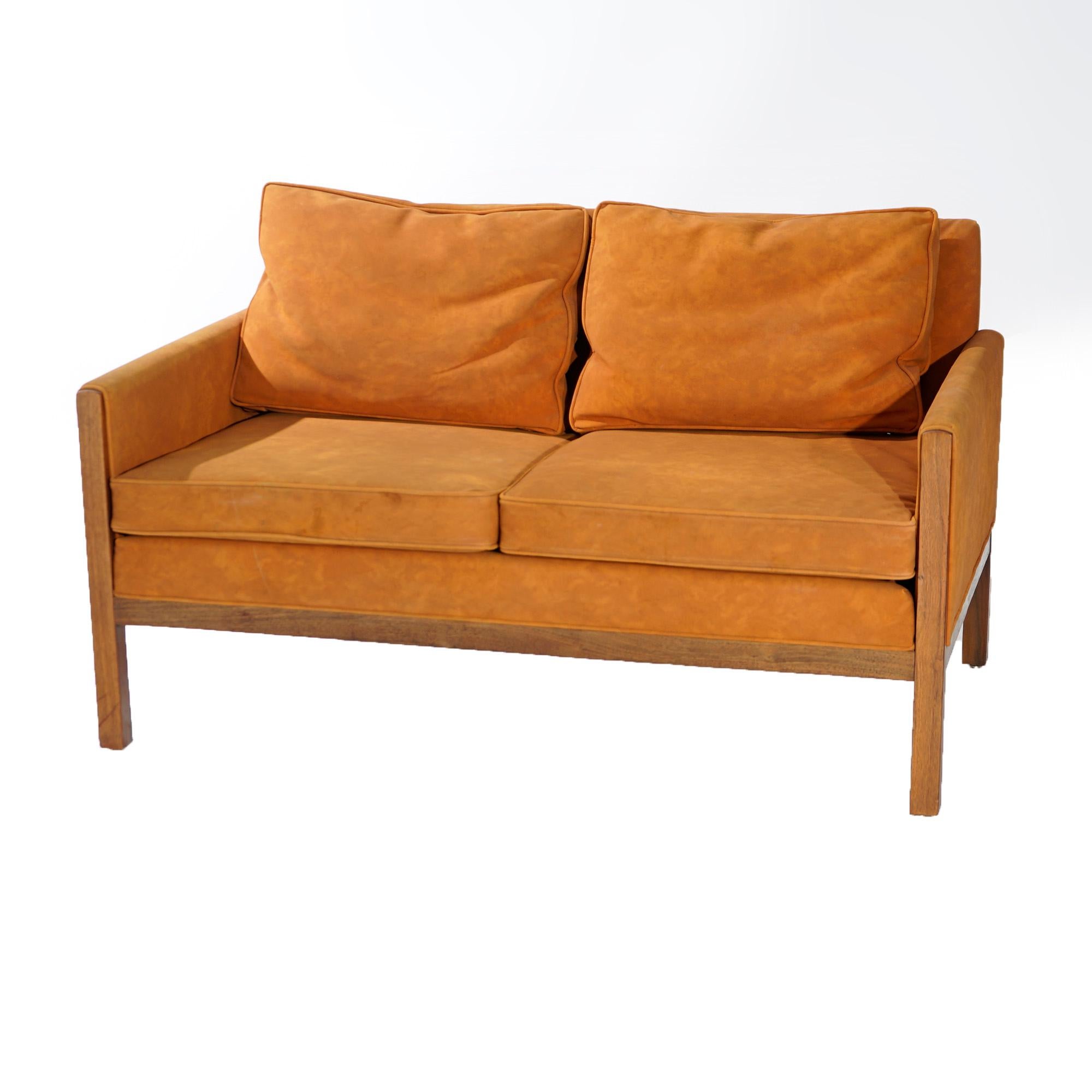 A Mid Century Danish Modern seating set by Thomasville includes settee and chair and offers walnut frame with leatherette upholstered seats, backs and arms, Founders as labeled, 20th century

Measures- chair 31.25''H x 27.25''W x 32''D; settee 30''H