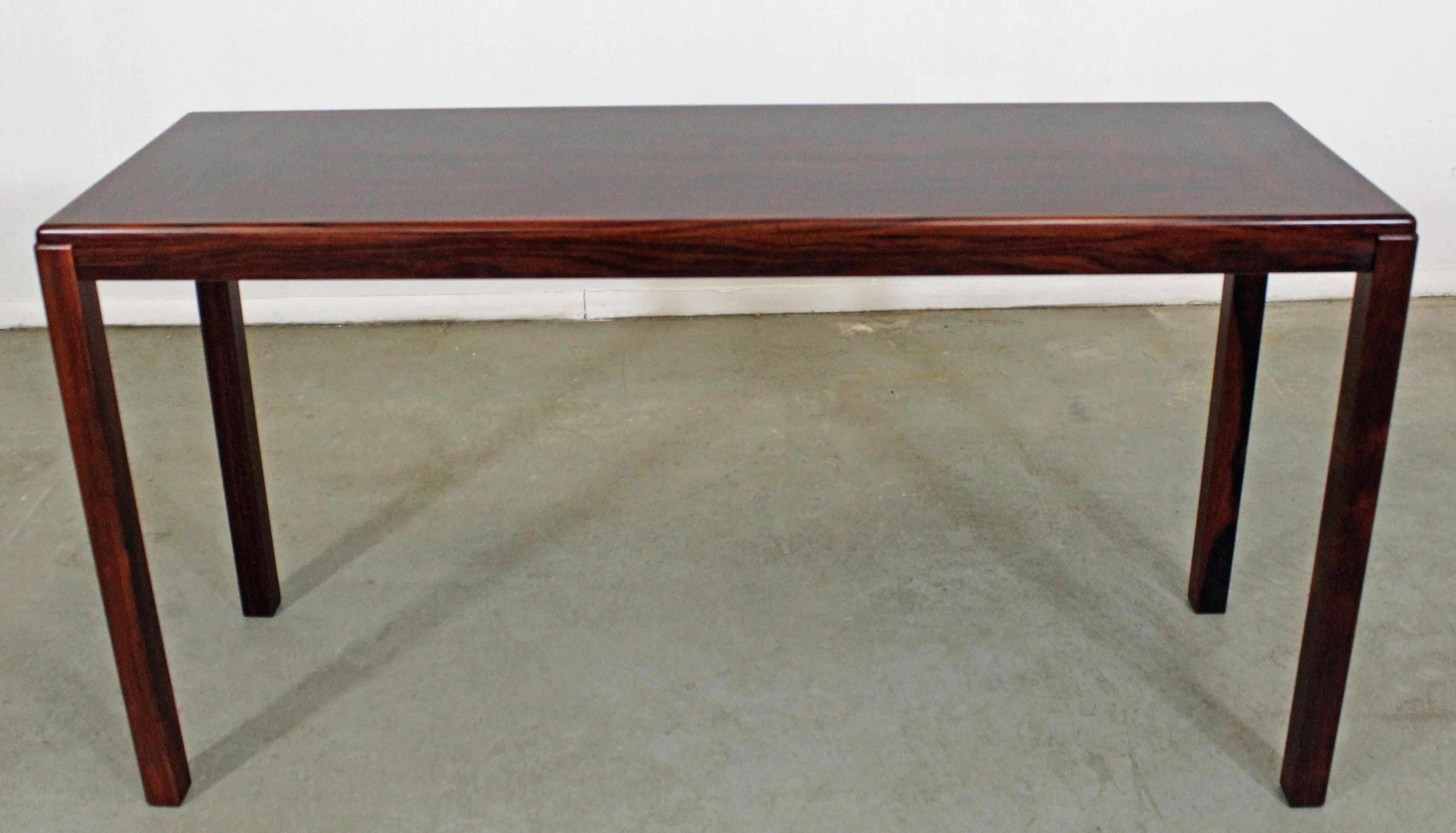 Midcentury Danish modern Vejle Stole Parquet top rosewood console table.

Offered is a beautiful Danish modern rosewood console table with a parquet top made by Vejle Stole & Mobelfabrik. It is in very good condition for its age, showing slight