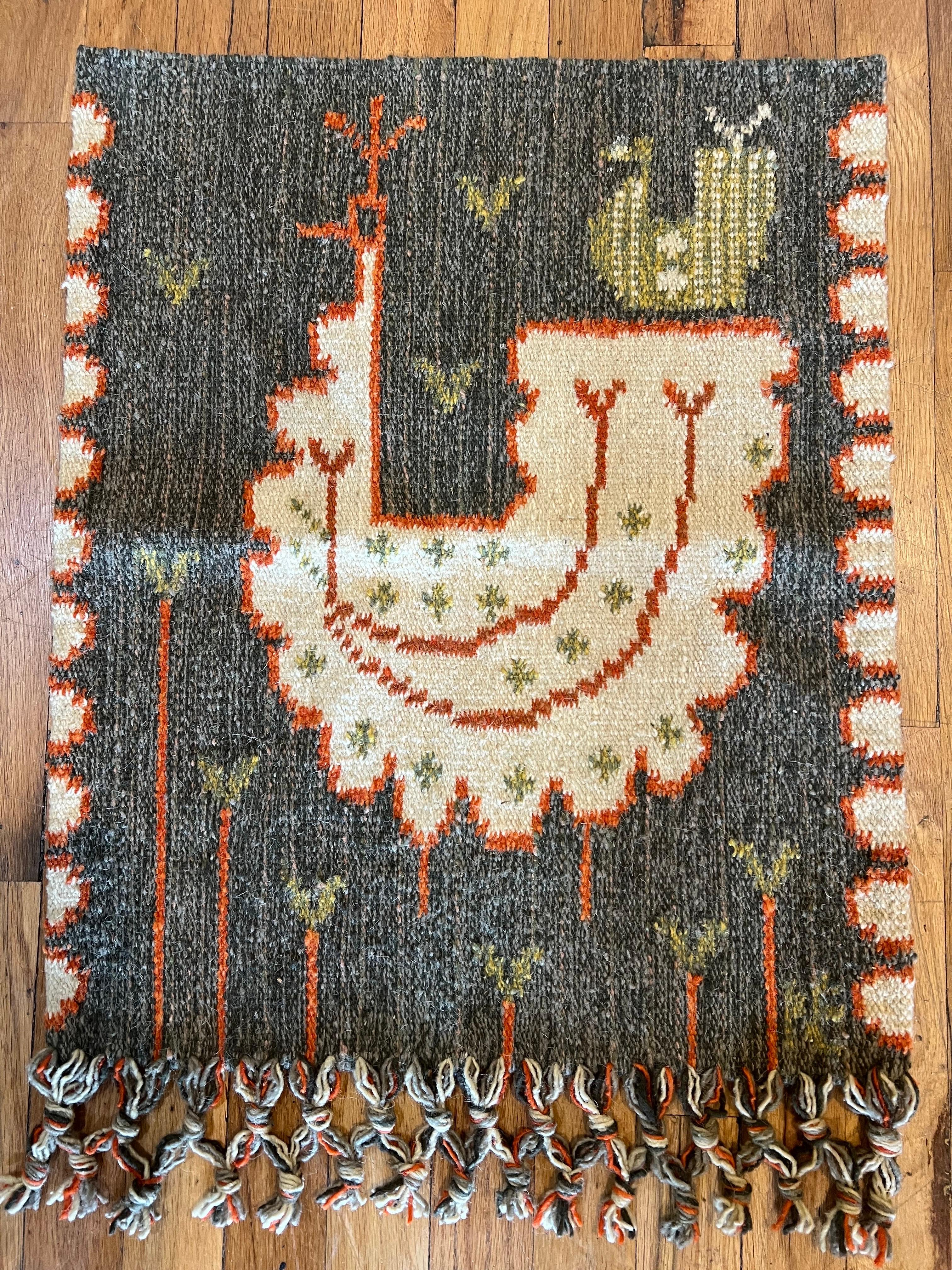 Transport yourself to mid-century Scandinavia with this exquisite Vintage Wall Carpet by Eva Nemeth, hailing from Hungary. Crafted with meticulous attention to detail, this wool woven tapestry epitomizes the fusion of Hungarian craftsmanship with