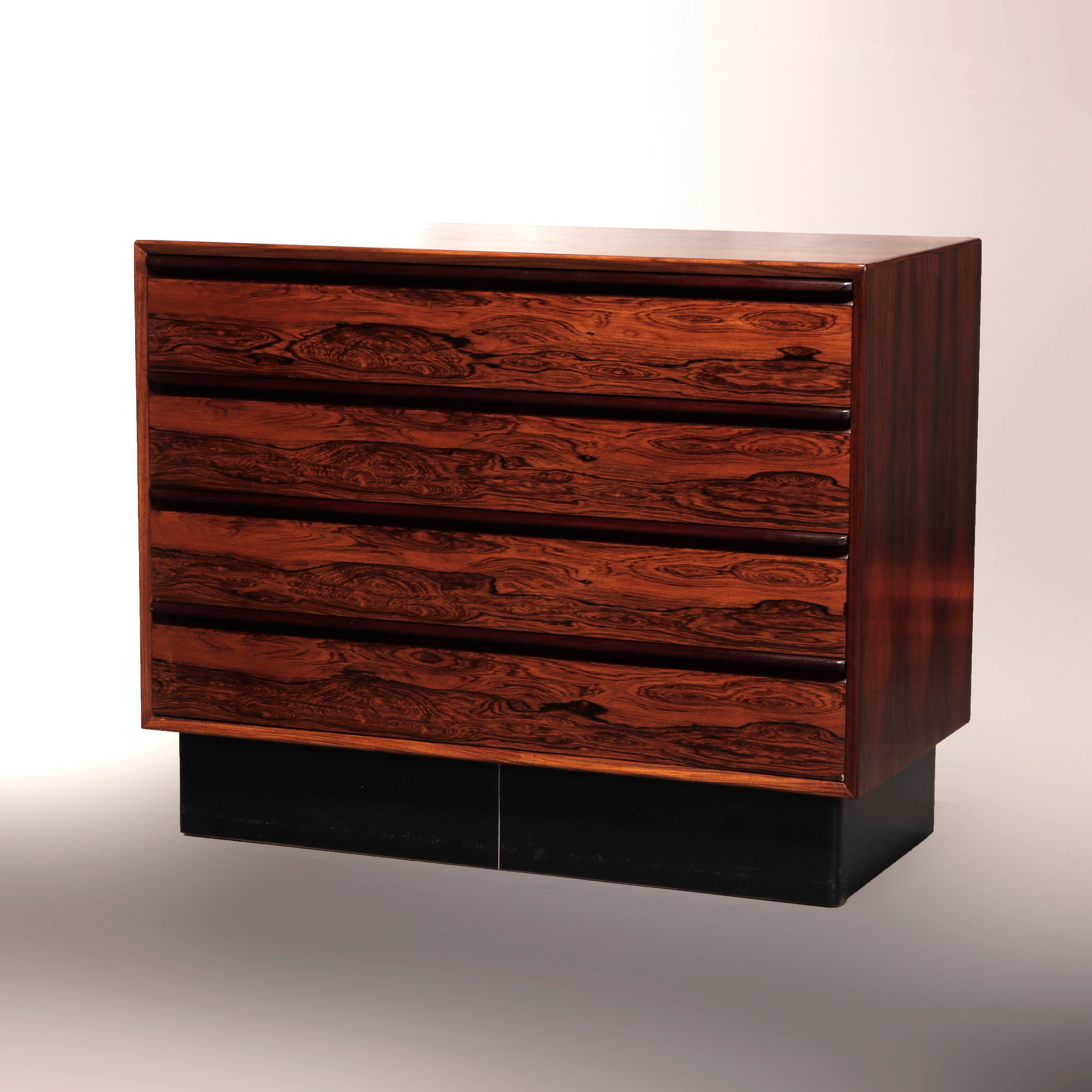 A midcentury Danish modern chest of drawers by Westnofa Furniture of Norway offers rosewood construction with four long drawers, circa 1960.

Measures: 29