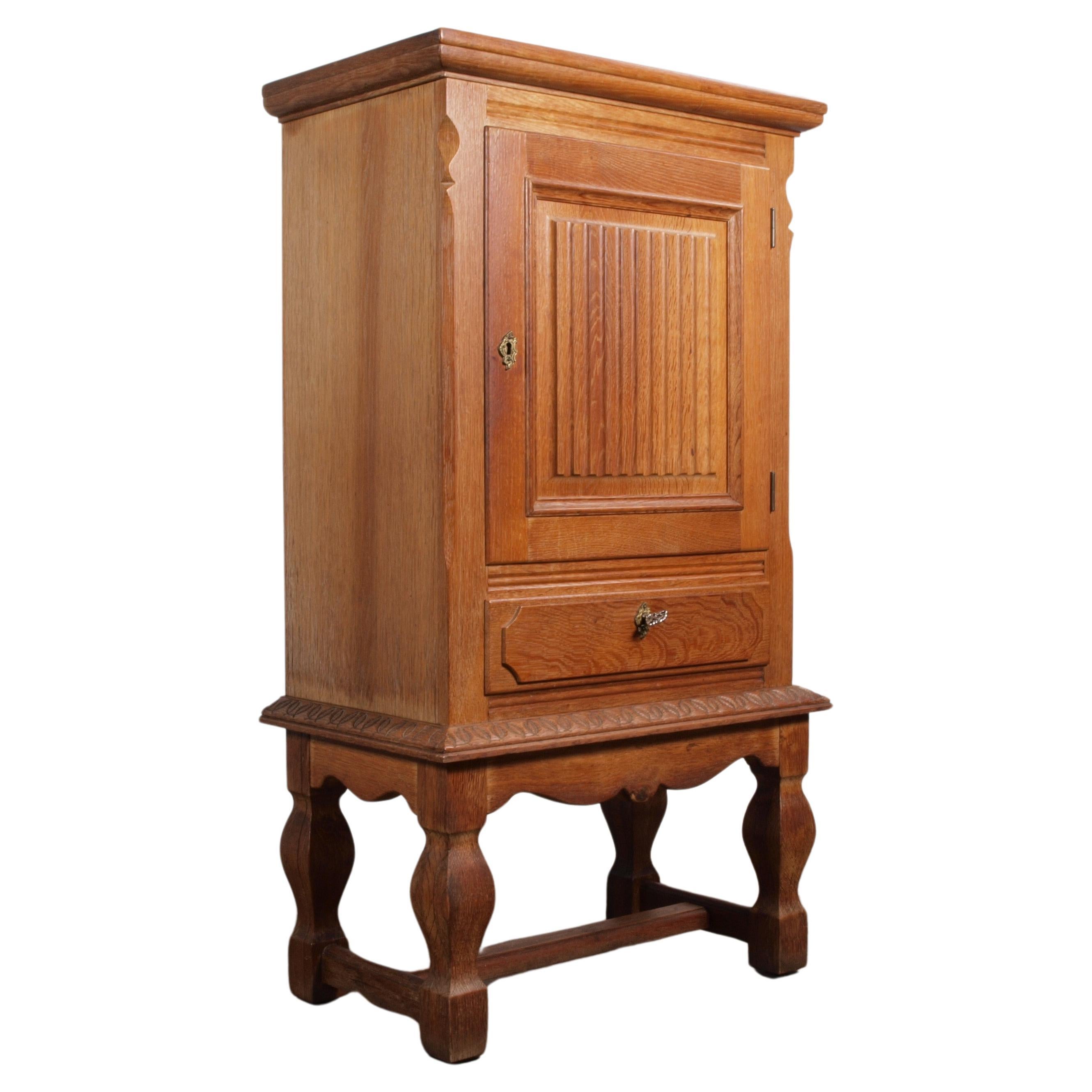 Mid-Century Danish Oak Cabinet in the style of Henning Kjaernulf For Sale