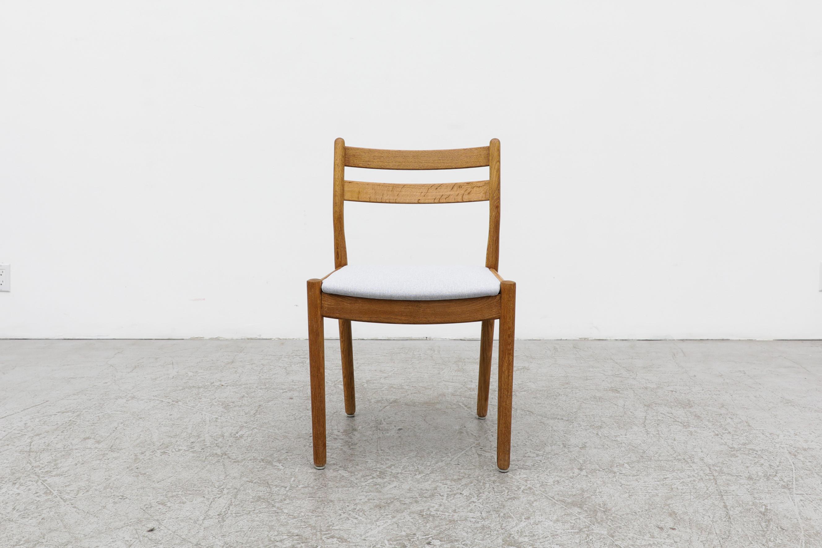 Single Poul Volther oak side chair with a light blue upholstered seat. The frame is in original condition with visible wear consistent with its age and use. The upholstery was most likely replaced by its' previous owner.