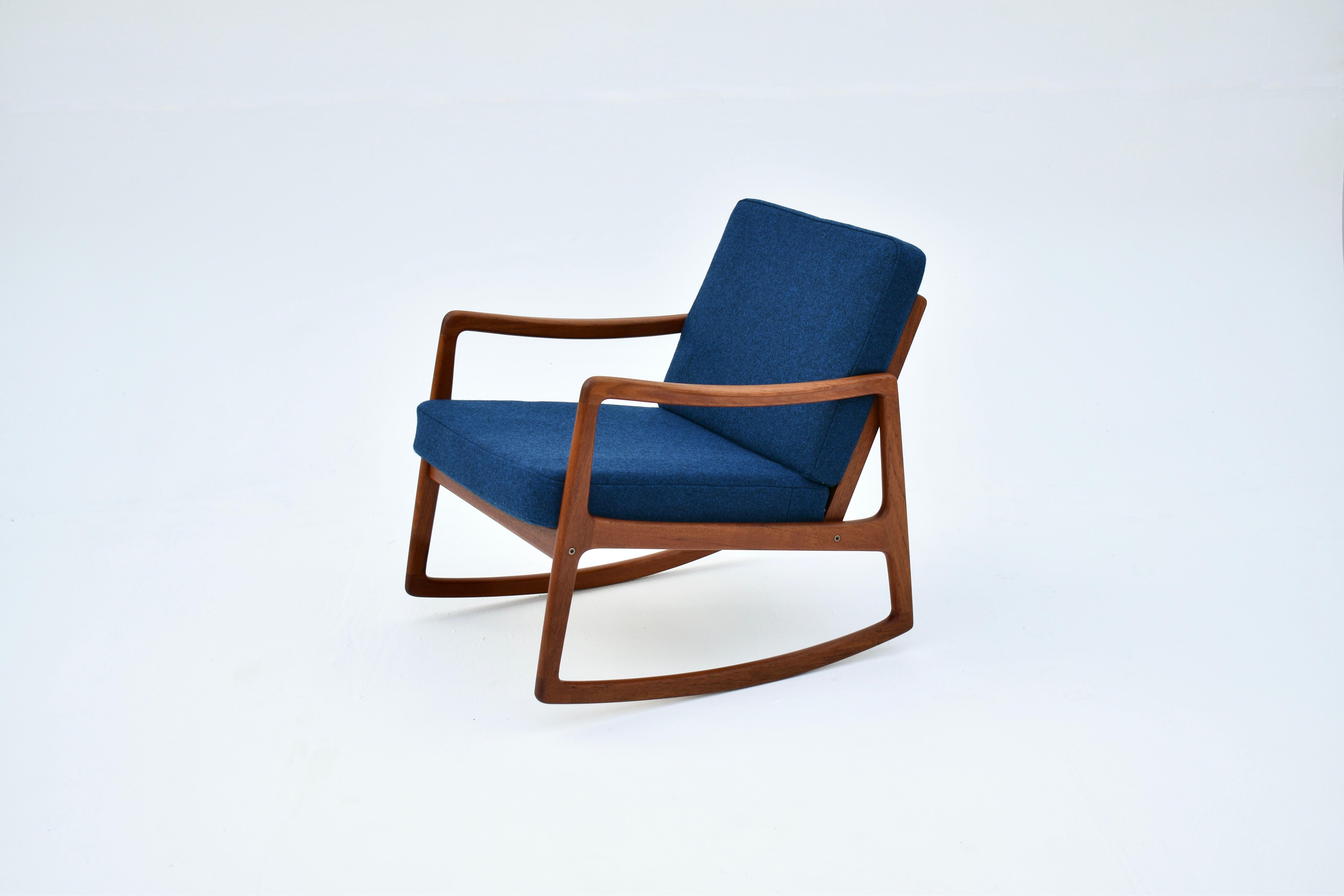 A superb and hard to find teak rocking chair designed by Ole Wanscher for France & Son, Denmark.

An absolute triumph of a design, the slenderness and elegance of the frame is remarkable, there is not a line out of place. This has always been one