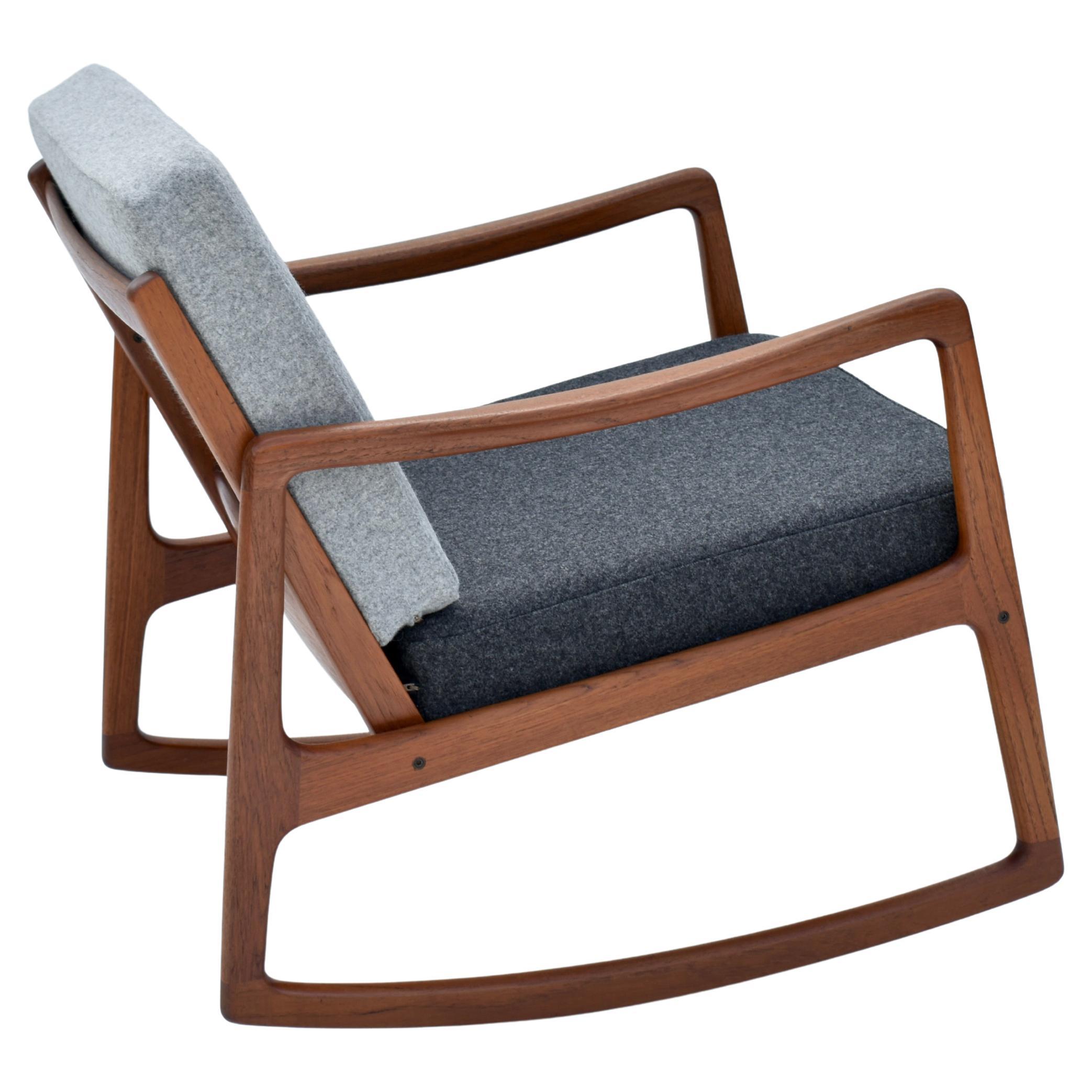A superb and hard to find teak rocking chair designed by Ole Wanscher for France & Son, Denmark.

An absolute triumph of a design, the slenderness and elegance of the frame is remarkable, there is not a line out of place. This has always been one of