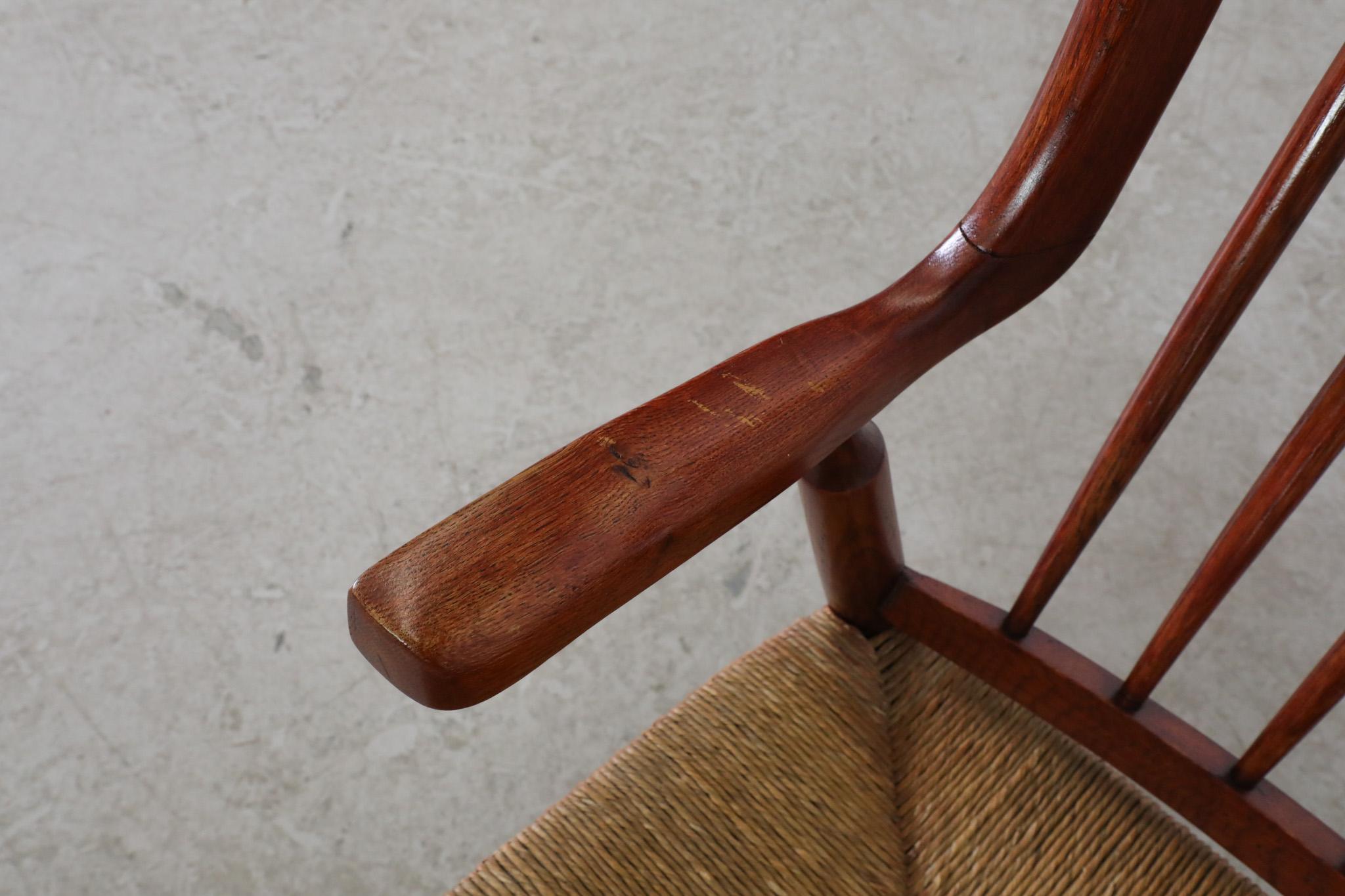 Mid-Century Danish Organic Curved Back Spindle Back Rocking Chair with Rush Seat For Sale 4