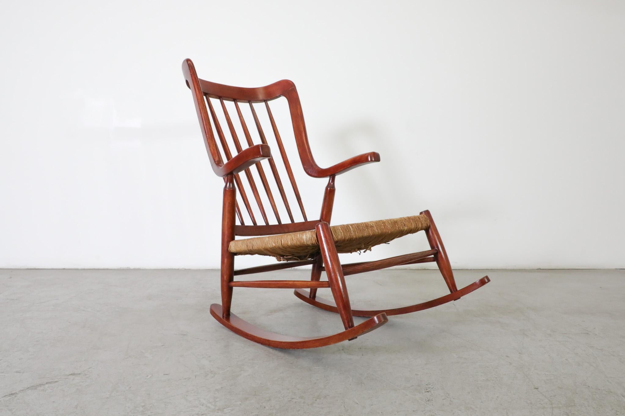 Mid-Century Danish Organic Curved Back Spindle Back Rocking Chair with Rush Seat For Sale 1
