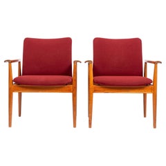 Mid Century Danish Red Lounge Chairs by Finn Juhl for France & Daverkosen