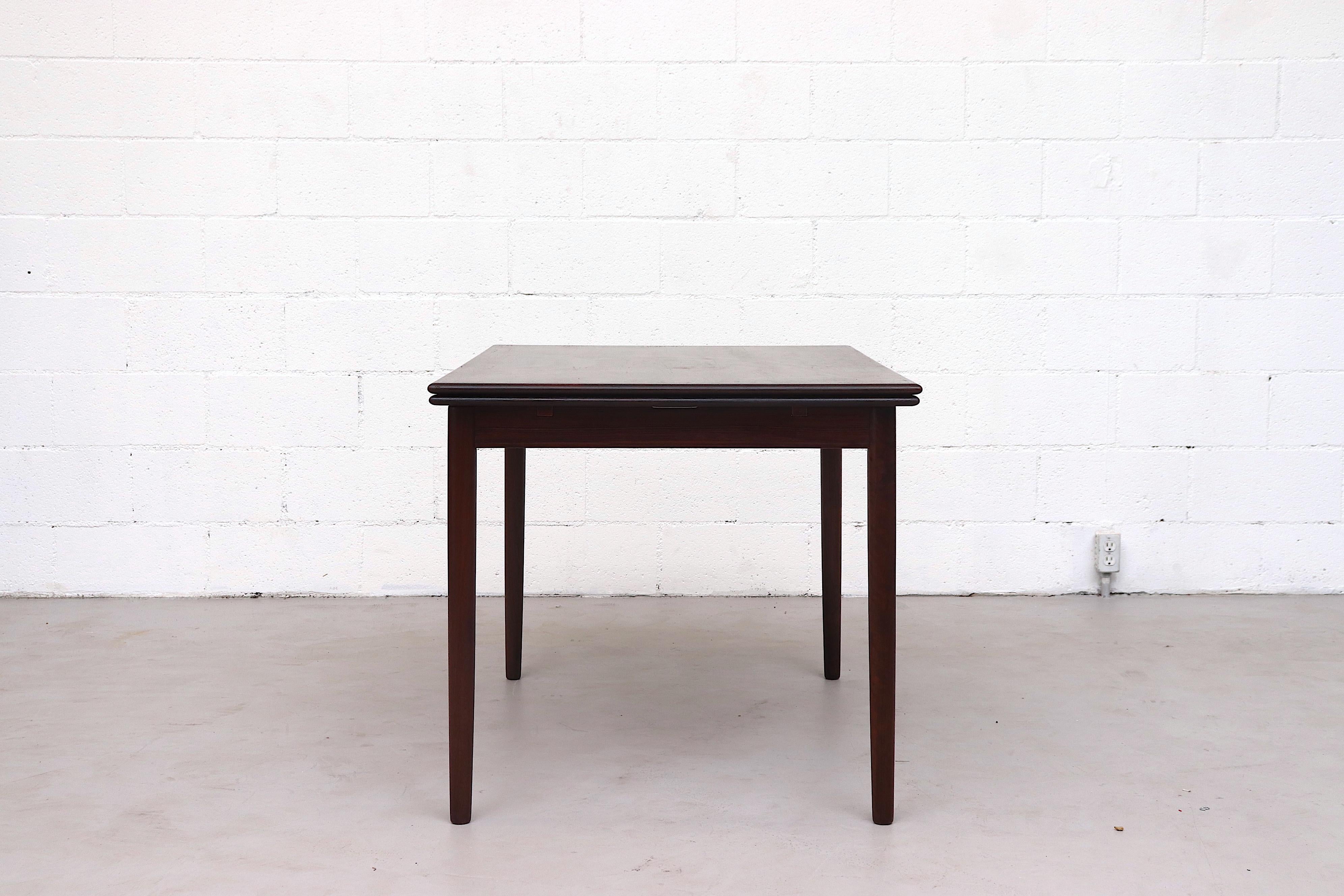 Midcentury Danish Rosewood Dining Table with Leaves In Good Condition In Los Angeles, CA