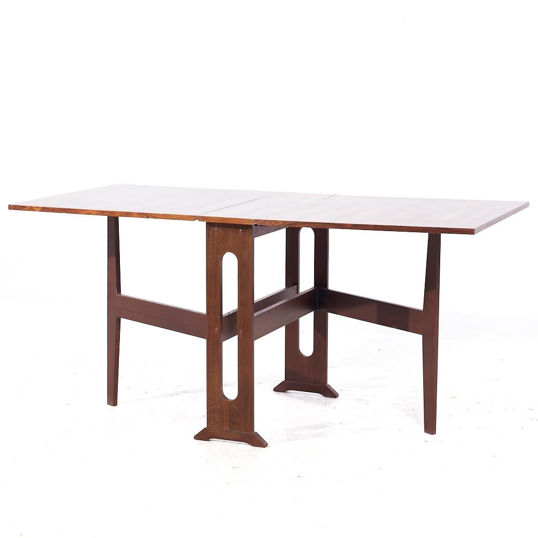 Mid-Century Modern Table de salle à manger danoise du milieu du siècle en palissandre en vente