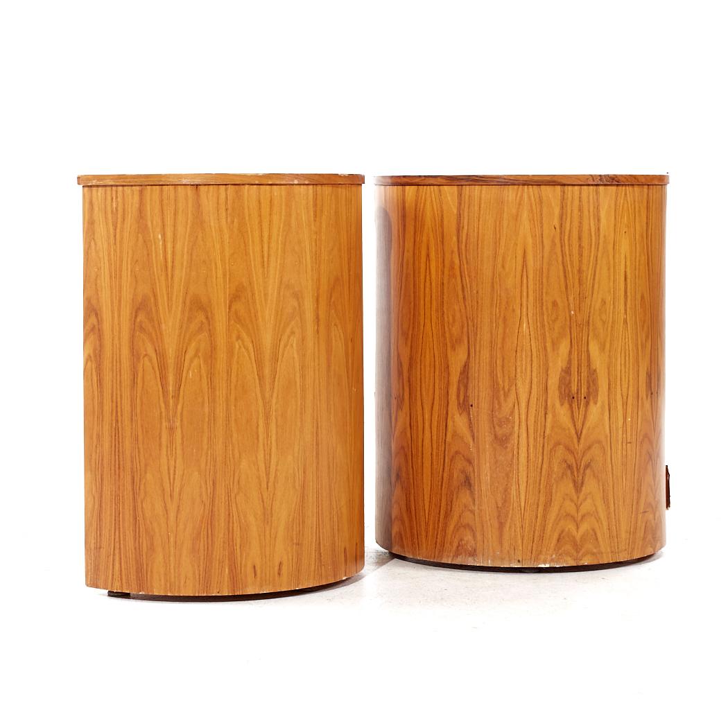 Mid Century Danish Rosewood Half Circle Pedestals - Pair

Each pedestal measures: 23.5 wide x 12.75 deep x 29.75 inches high

All pieces of furniture can be had in what we call restored vintage condition. That means the piece is restored upon
