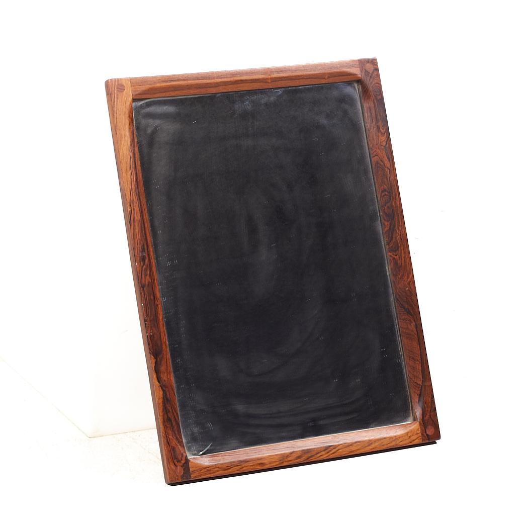 Mid Century Danish Rosewood Mirror

This mirror measures: 17.25 wide x 0.75 deep x 23.25 inches high

All pieces of furniture can be had in what we call restored vintage condition. That means the piece is restored upon purchase so it’s free of